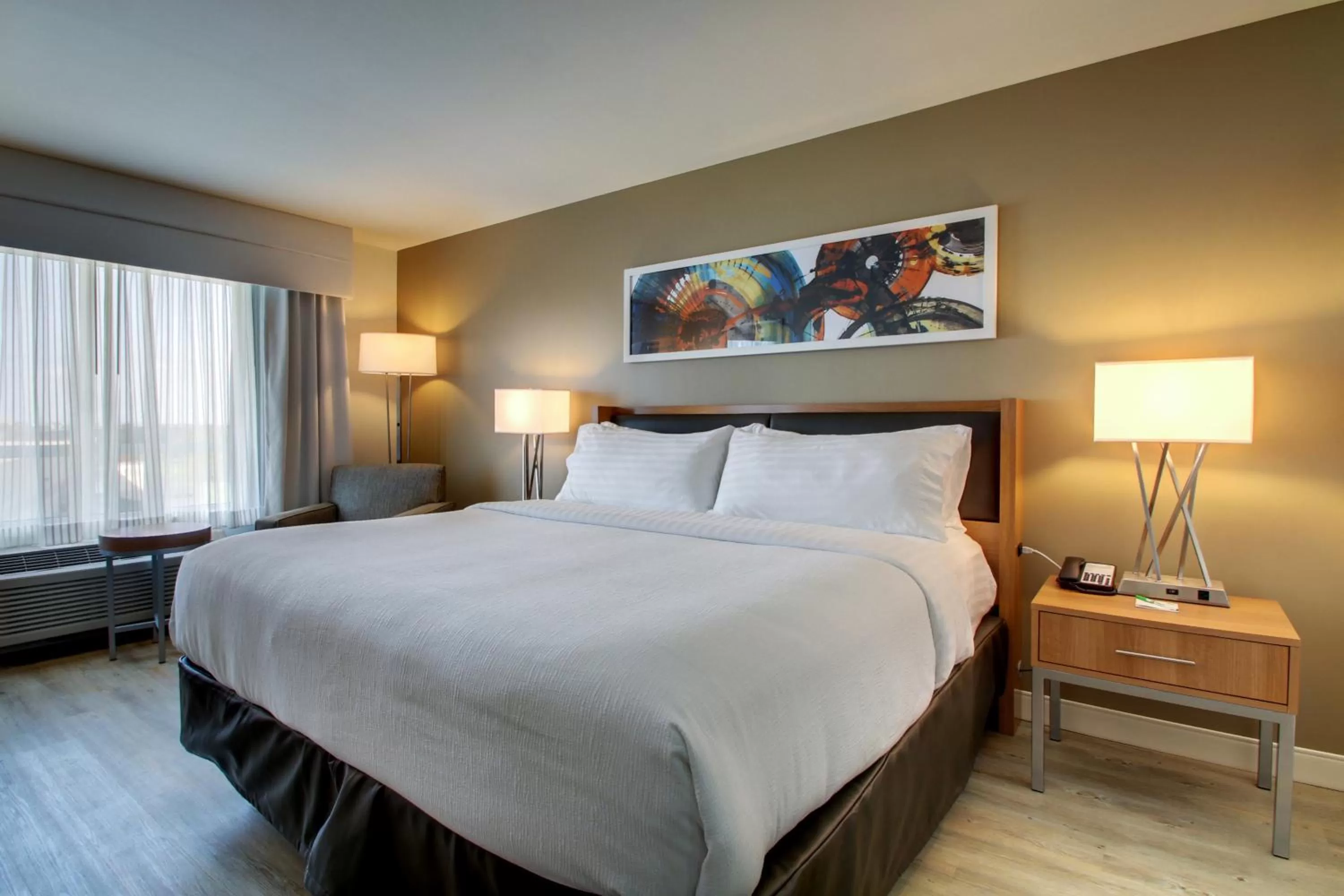 Bed in Holiday Inn & Suites Peoria at Grand Prairie by IHG