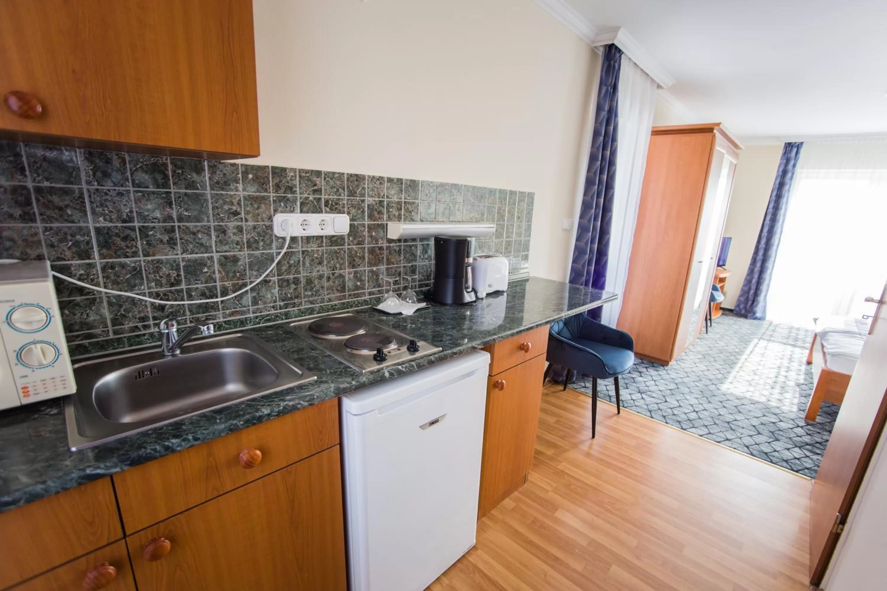 Kitchen or kitchenette in Hotel Viktória