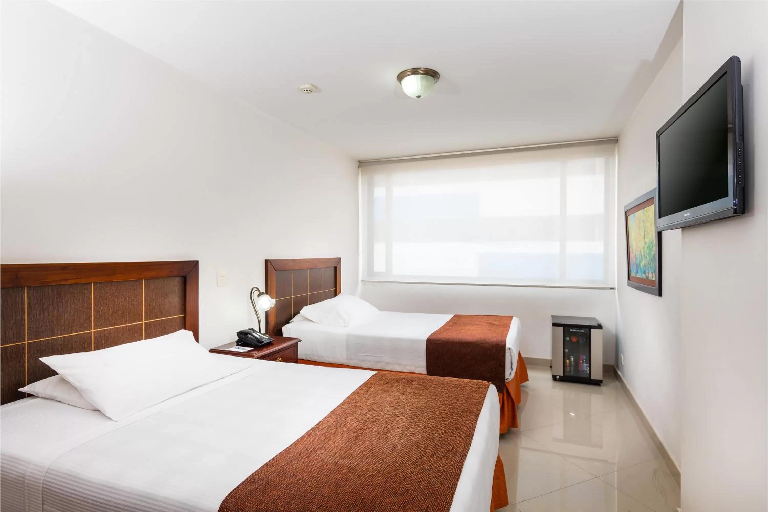 Bedroom, Bed in Hotel Dann Combeima