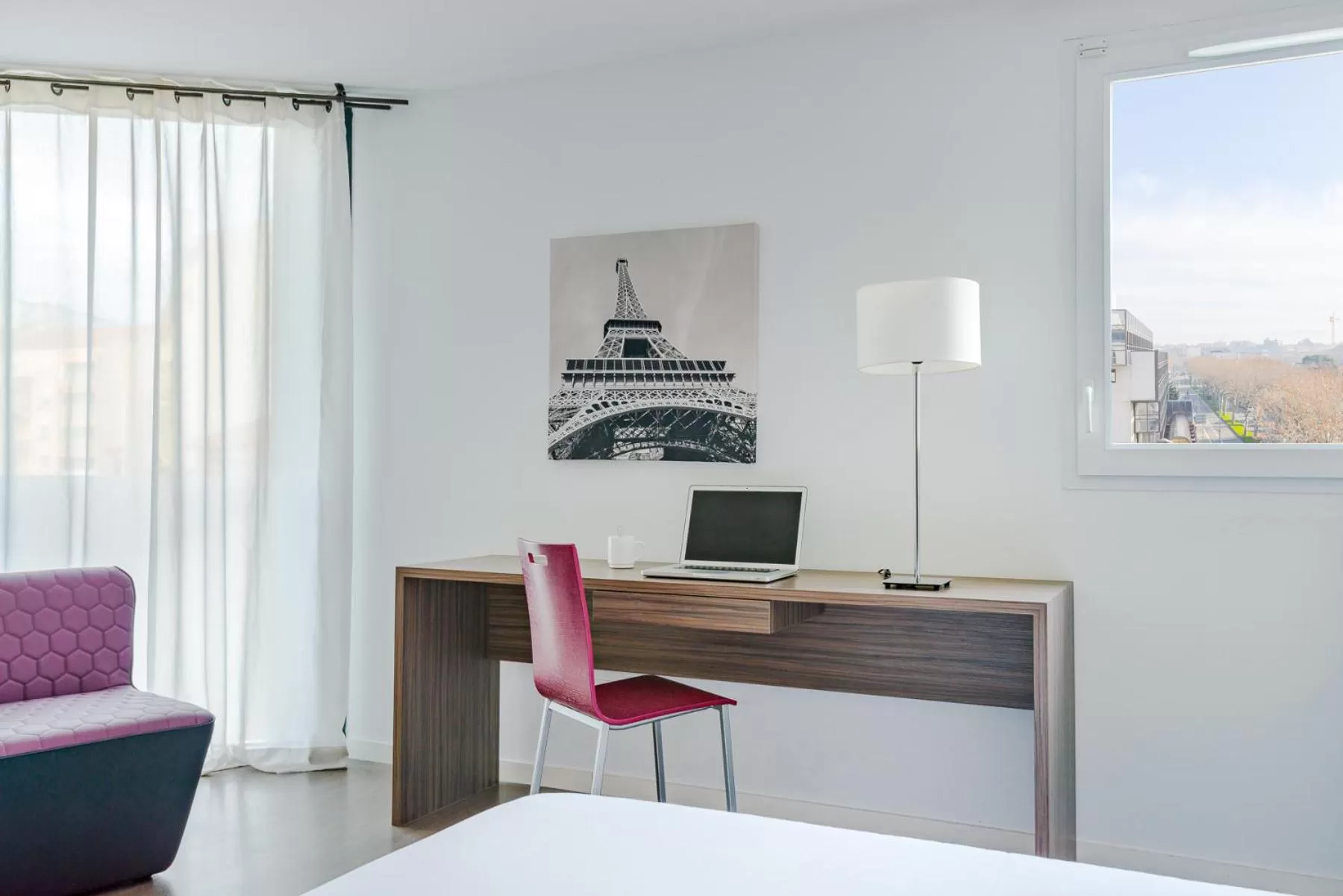 Seating area in The Originals Residence Appart Hôtel Hévéa Valence