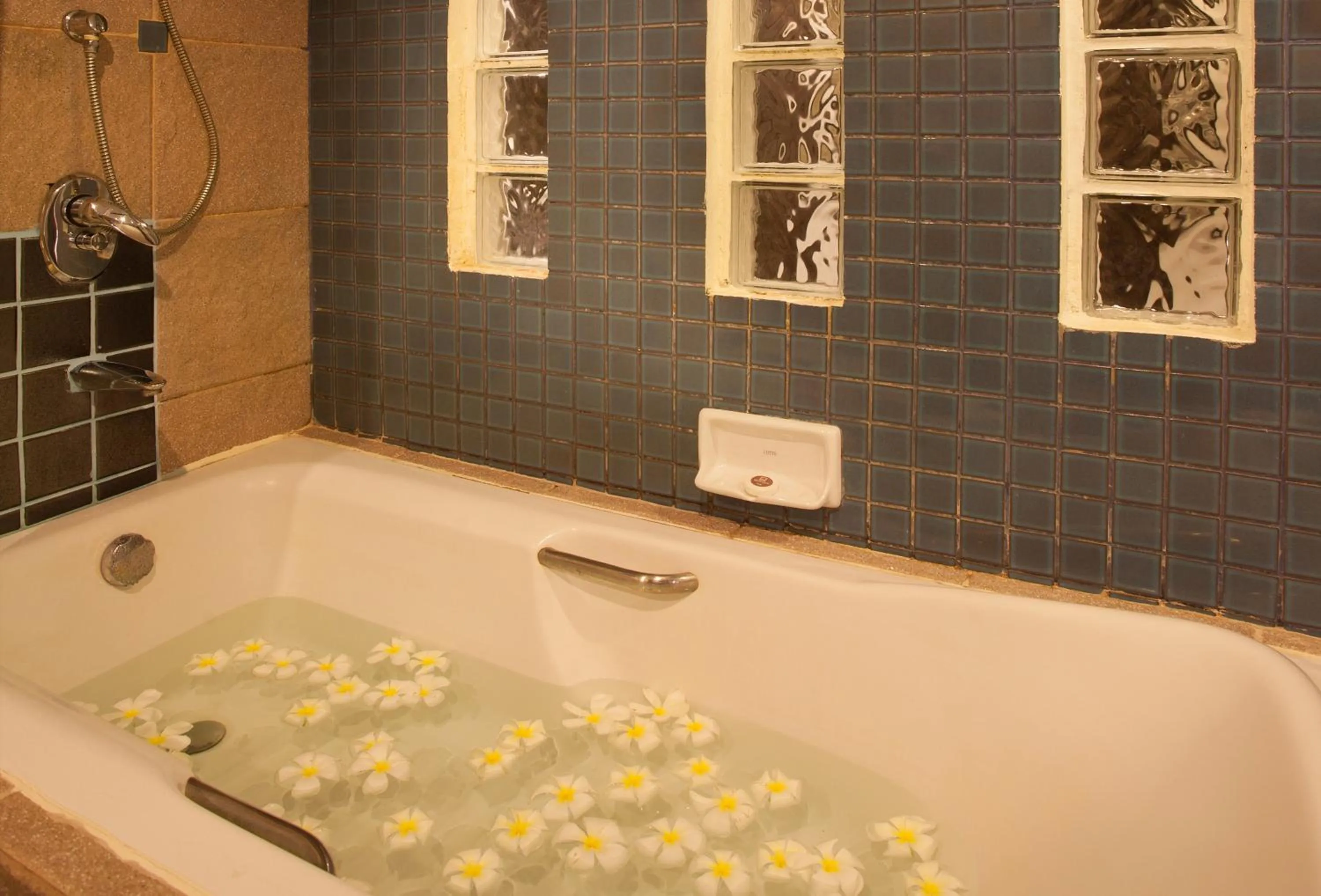 Bathroom in Woraburi Phuket Resort & Spa - SHA Plus