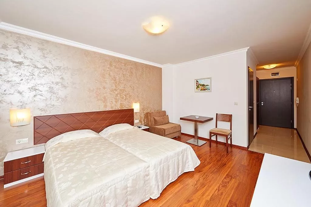 Bed in Penelopa Palace Apart Hotel & SPA