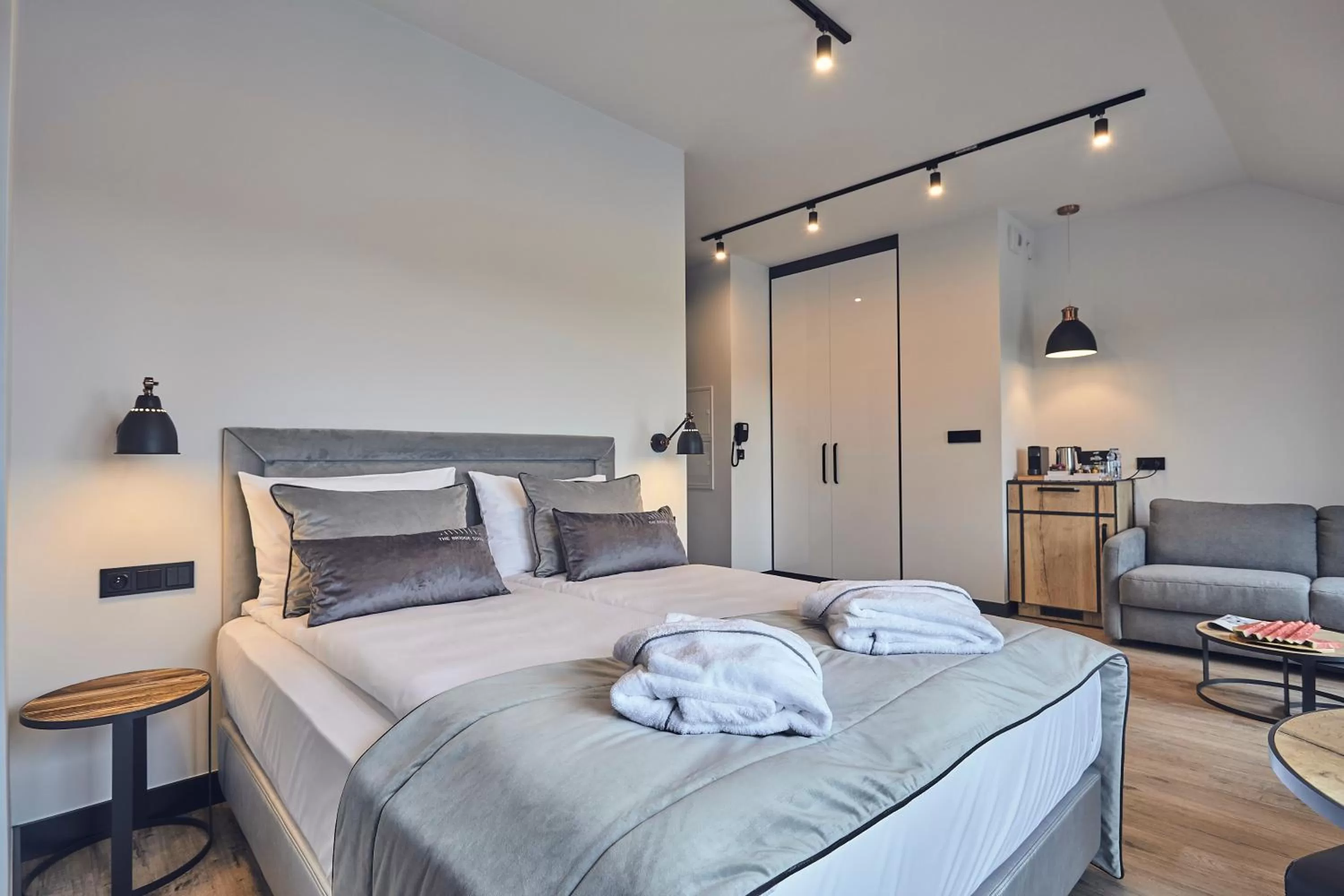 Bed in The Bridge Suites Hotel