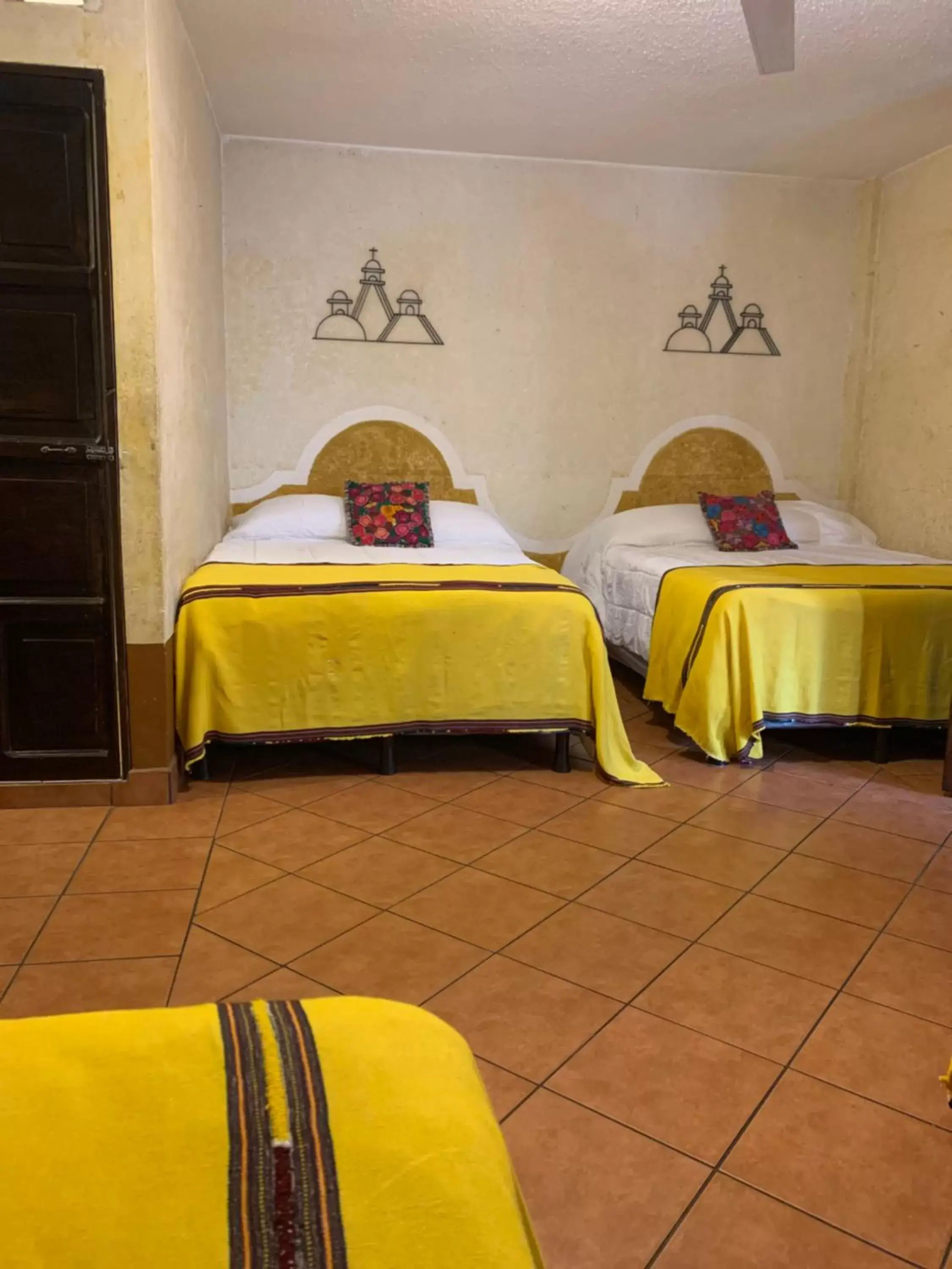 Triple Room in Hotel Posada Don Valentino Triple Room in Hotel Posada Don Valentino