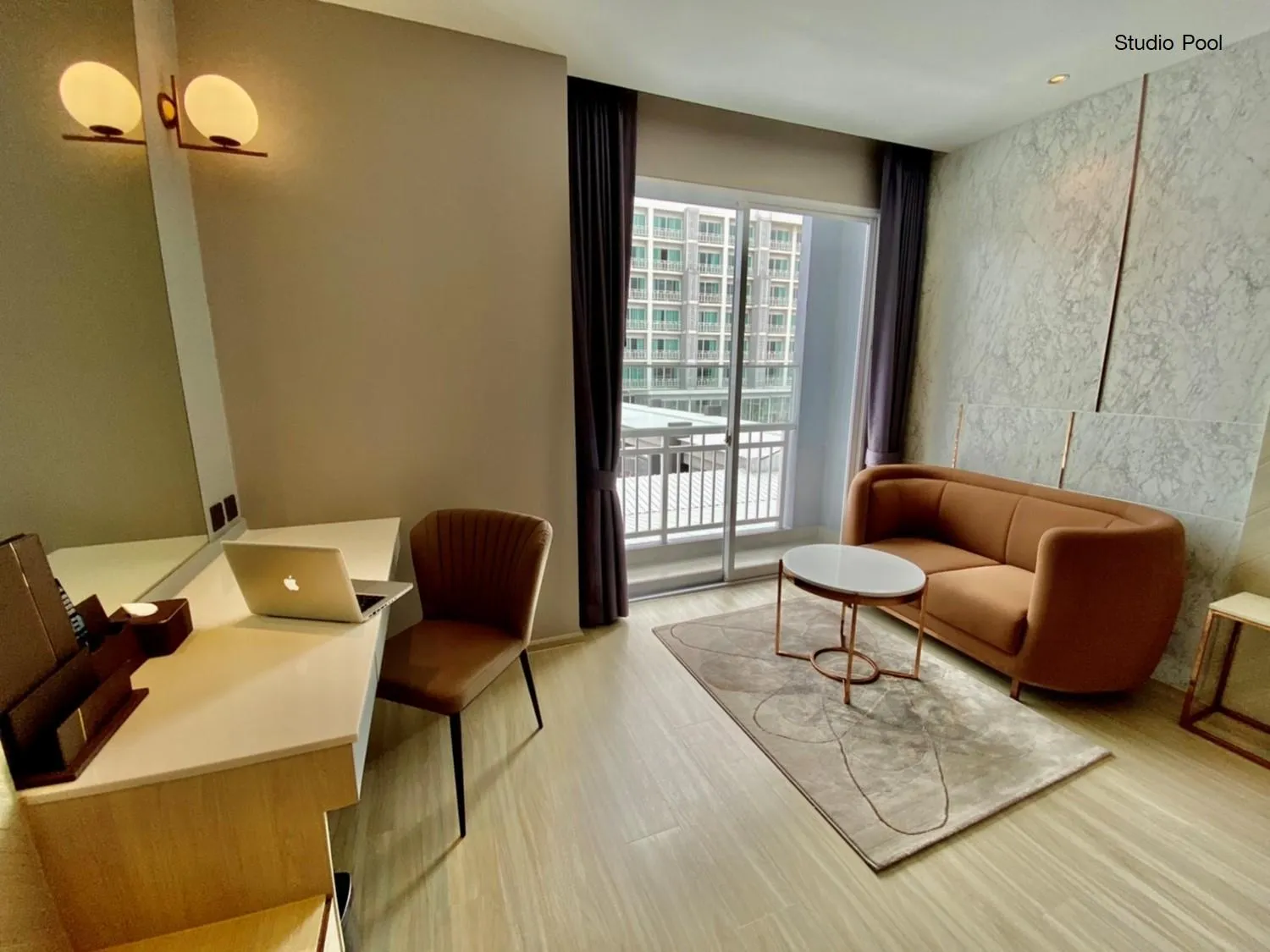 Living room in Golden City Rayong Hotel