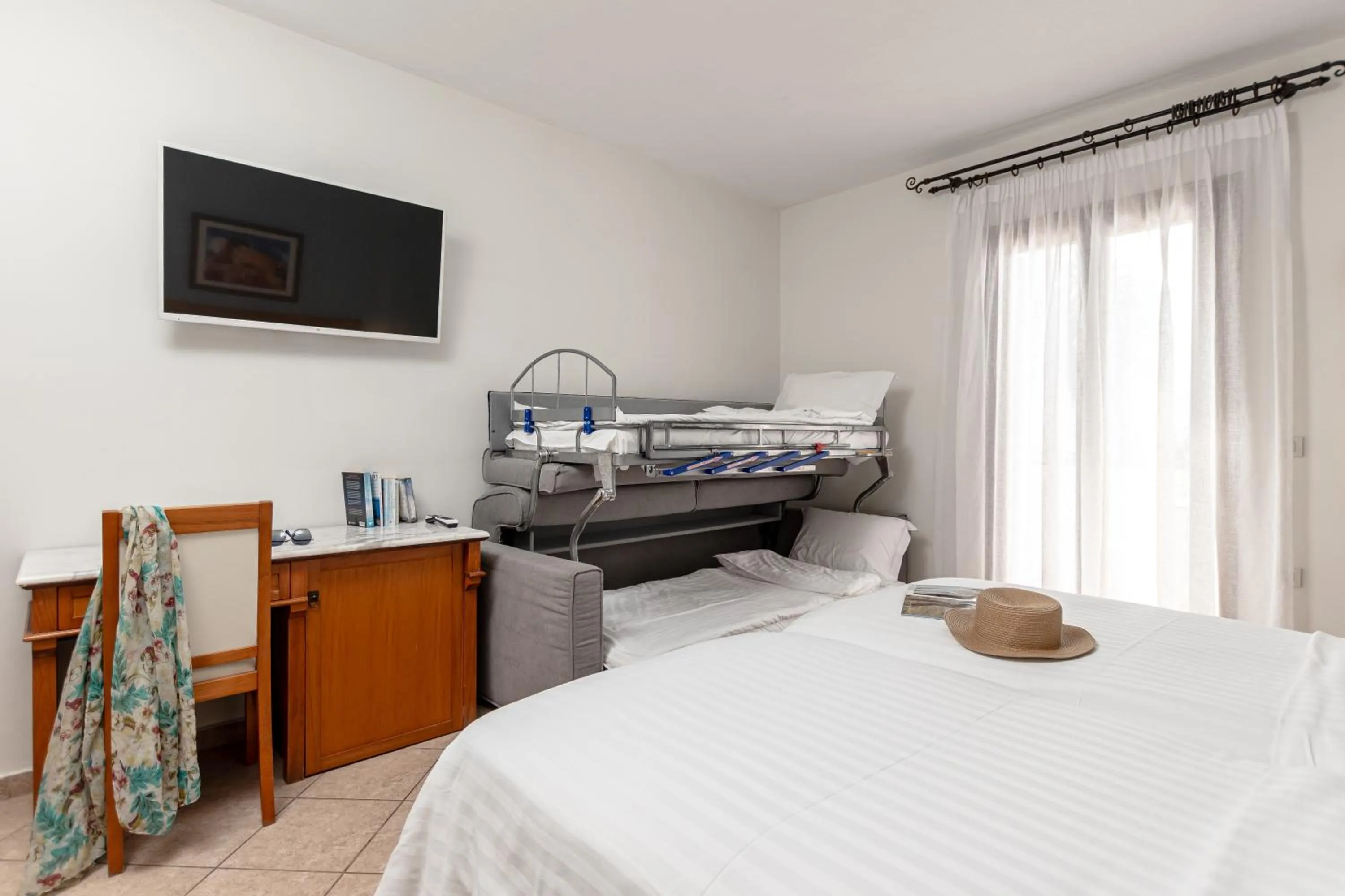 Bedroom in Naxos Resort Beach Hotel