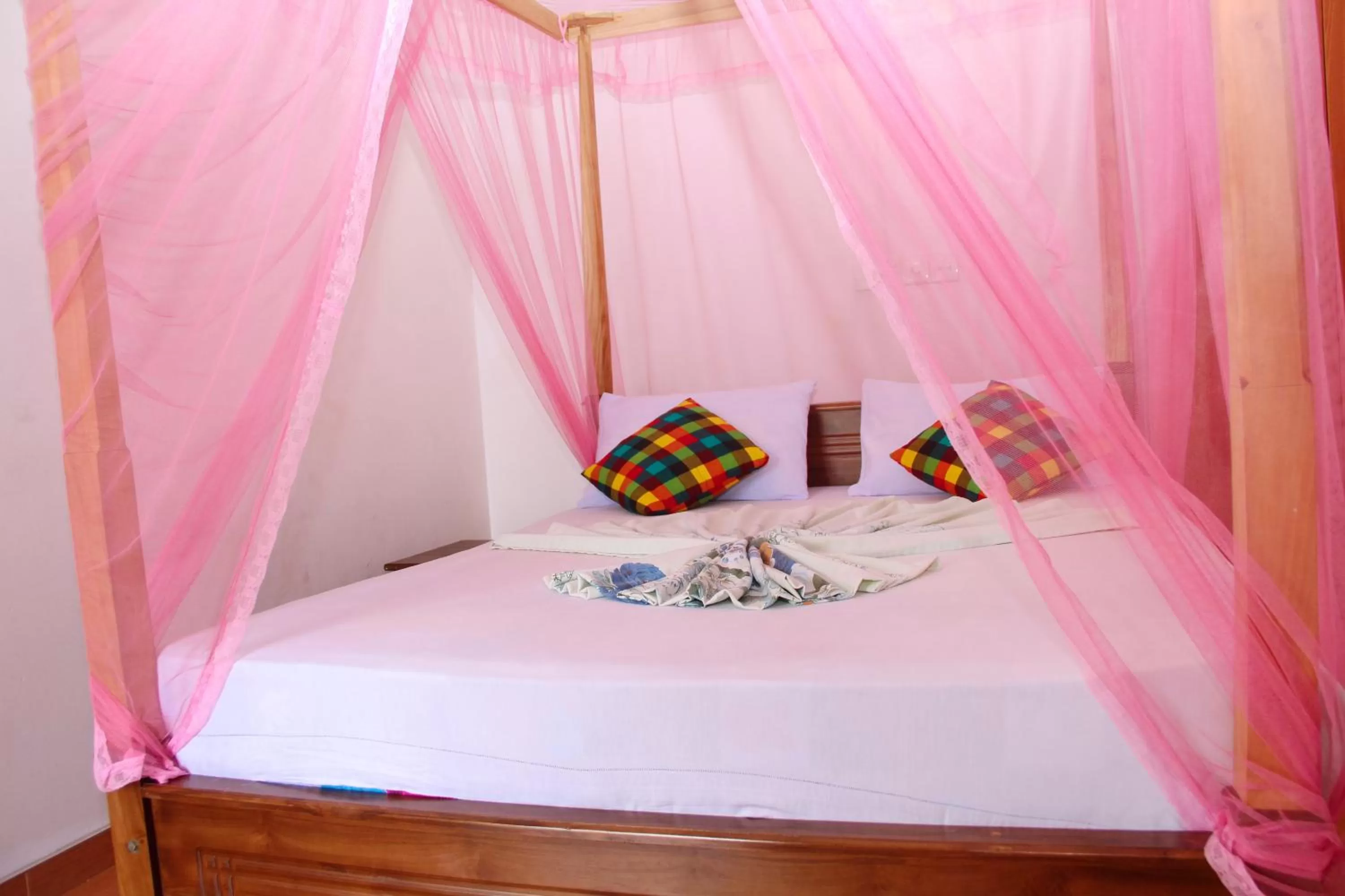 Bed in Pearl Resort Mirissa