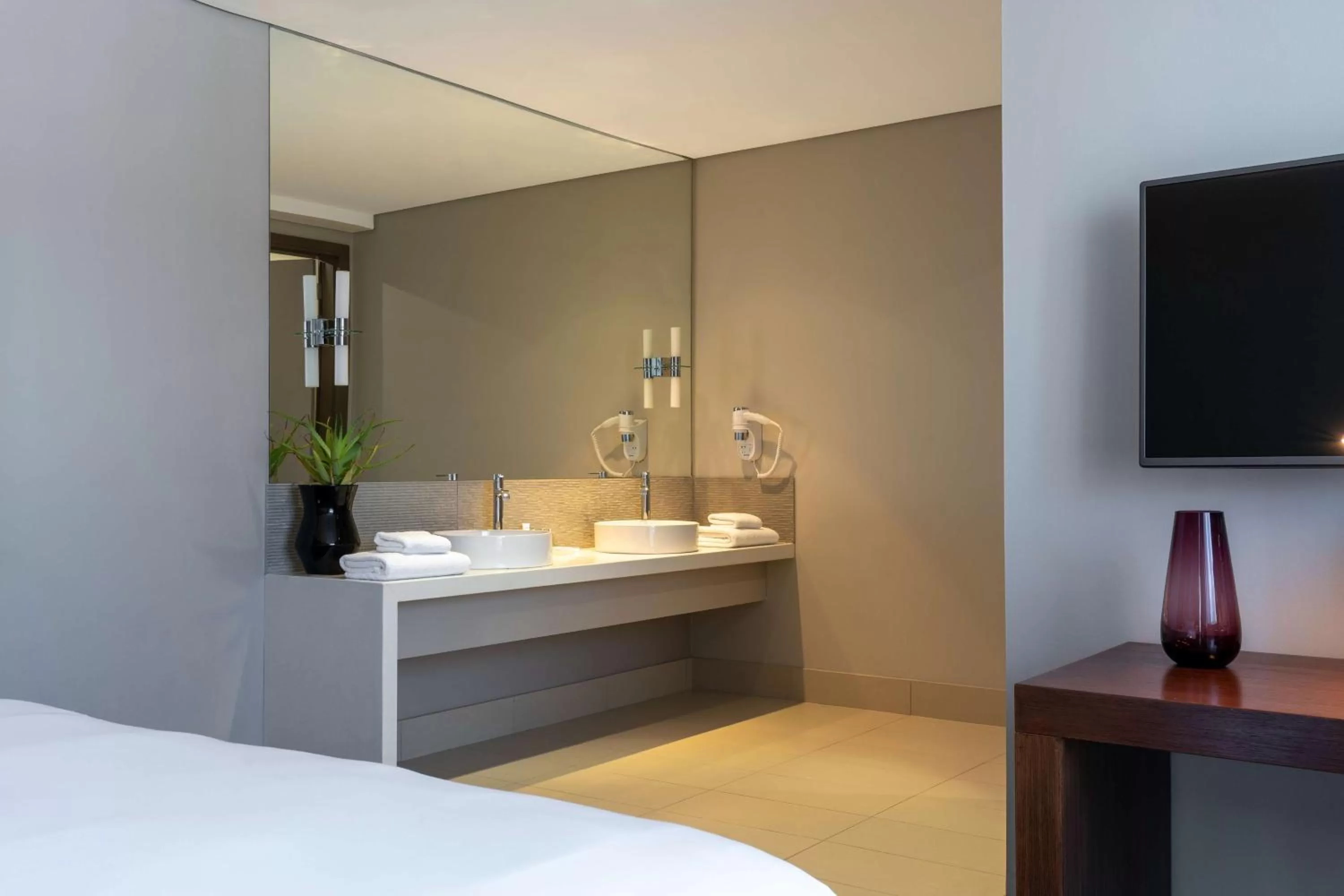 Photo of the whole room, Bed in Radisson Blu Gautrain Hotel, Sandton Johannesburg