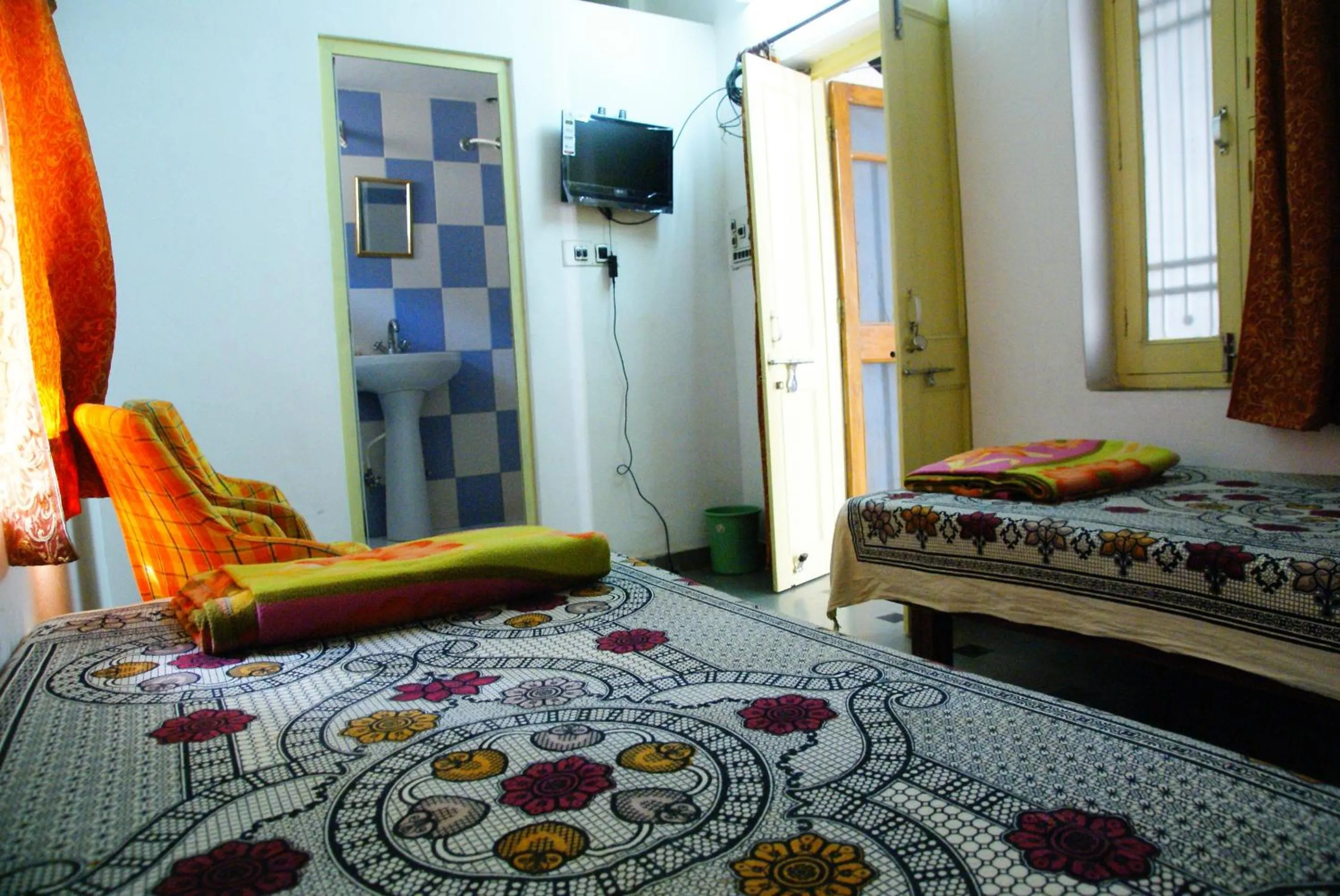 Bed in Udai Haveli Guest House