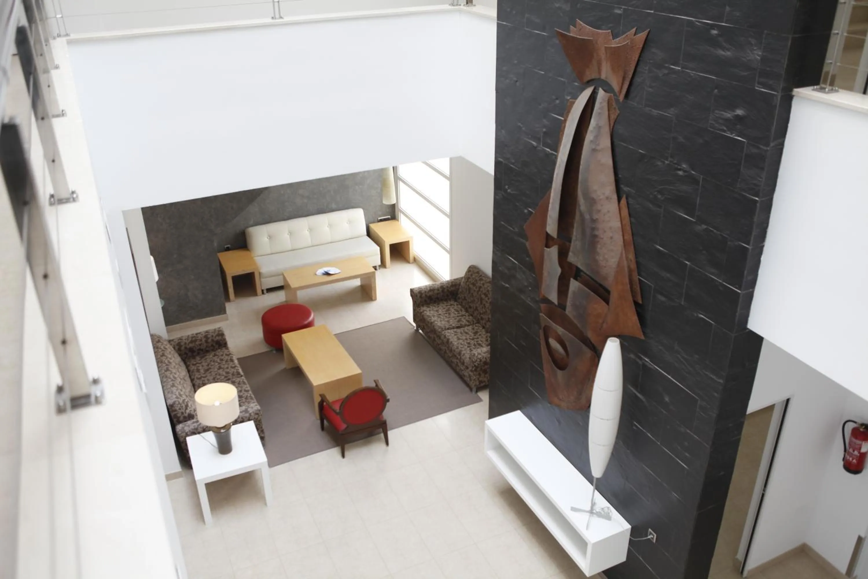 Communal lounge/ TV room in Hotel Adiafa