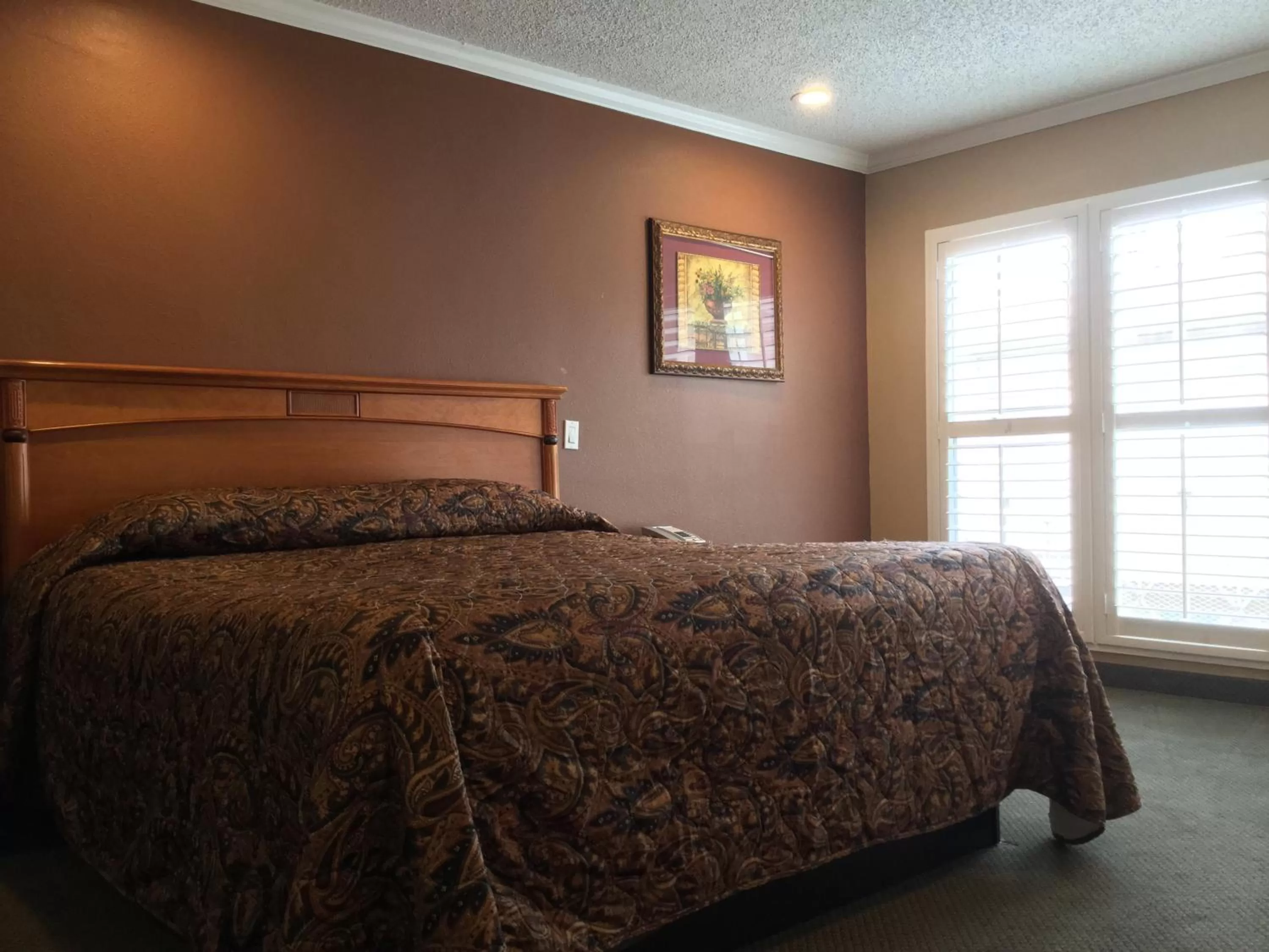 Bed in Bevonshire Lodge Motel