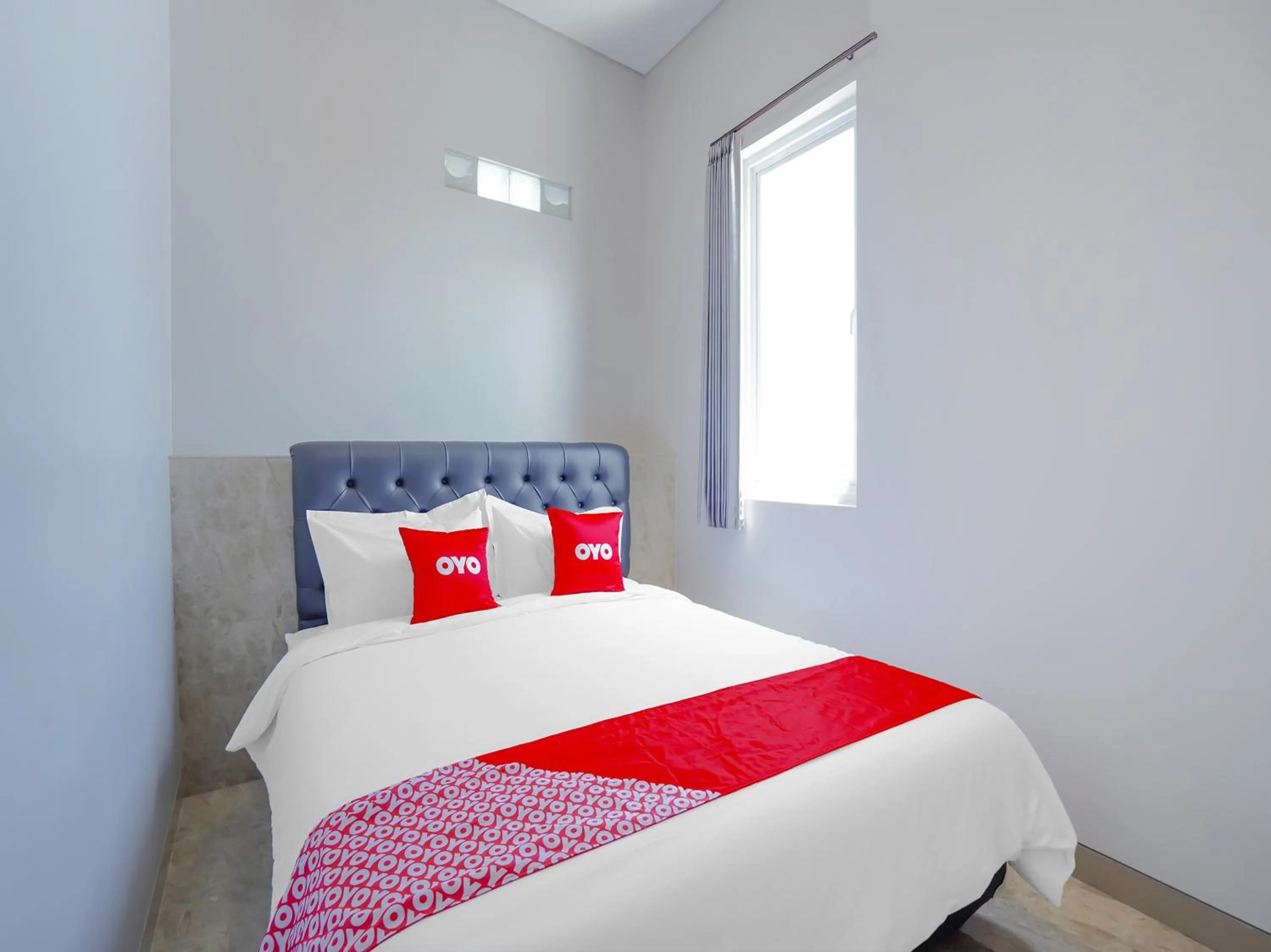 Bedroom in Capital O 90336 Olive Guest House