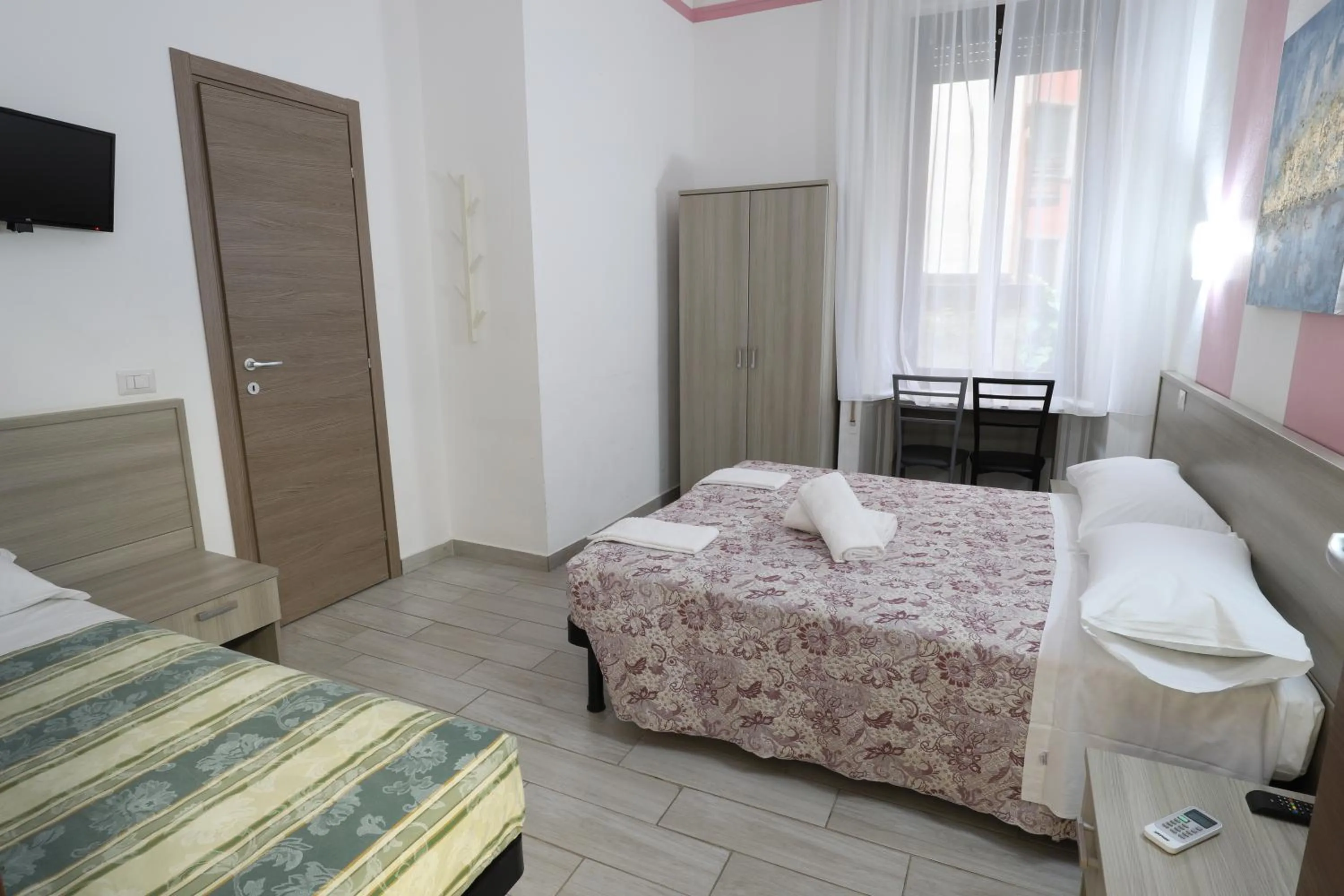 Photo of the whole room, Bed in Albergo Leonardo Da Vinci