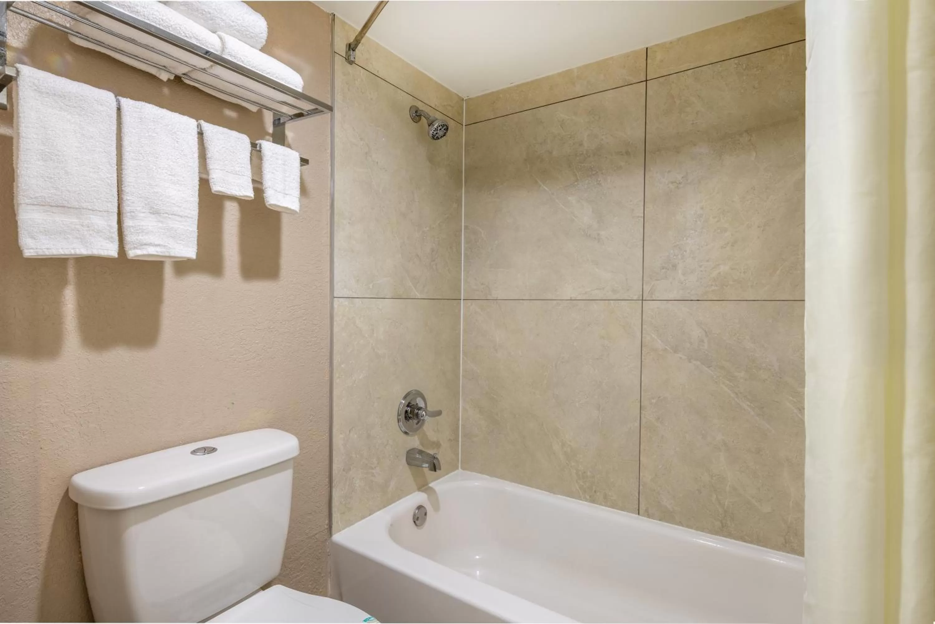 Bathroom in Super 8 by Wyndham McDonough GA