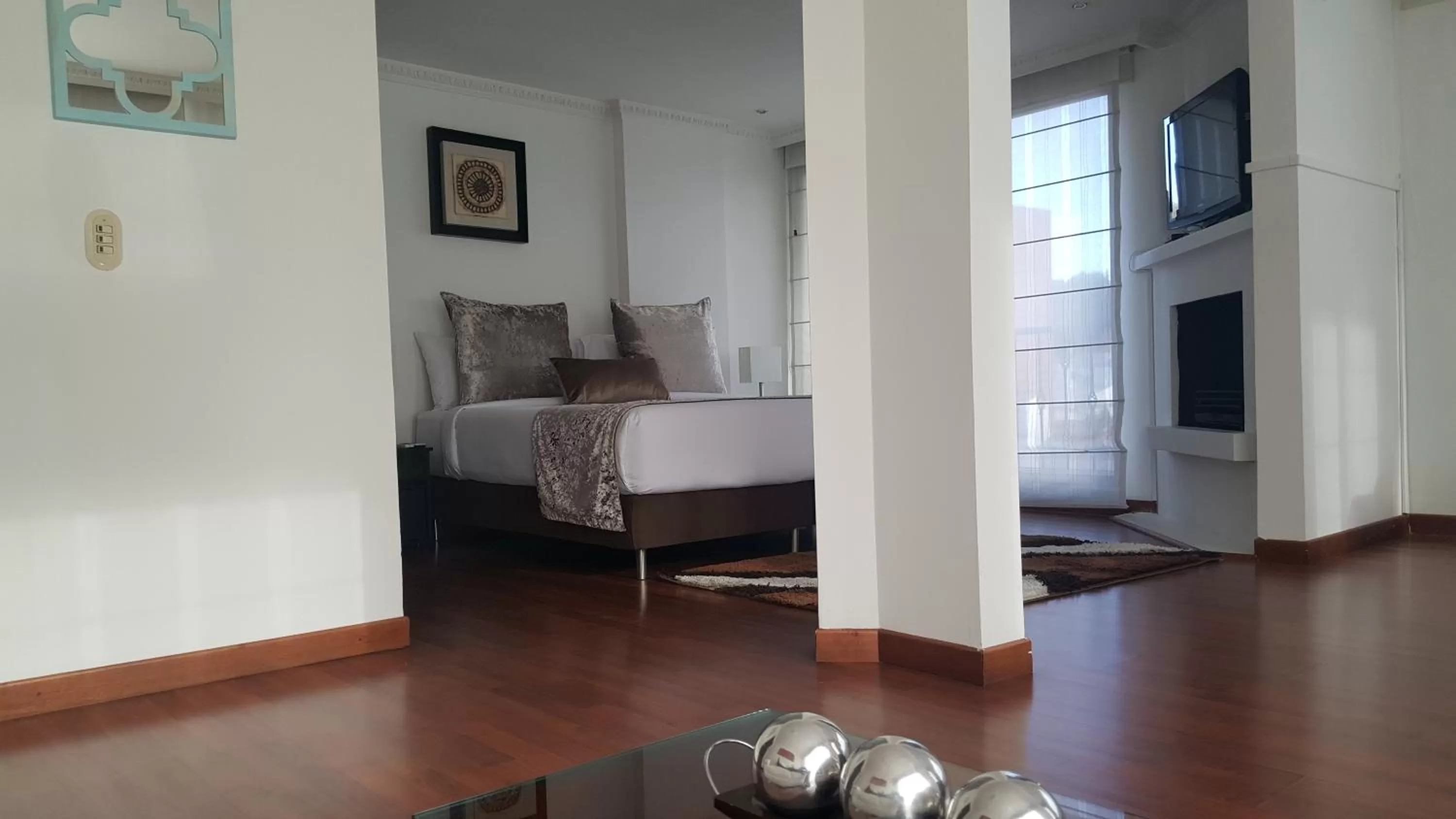 Bed, Seating Area in Suites 109 GH Usaquén