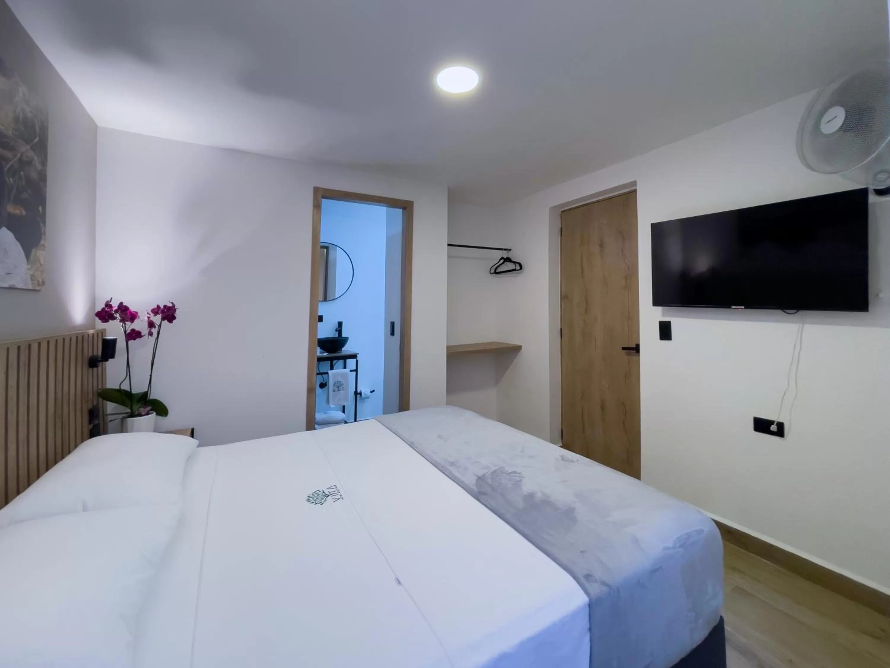 Bed in Vita Hotel Boutique