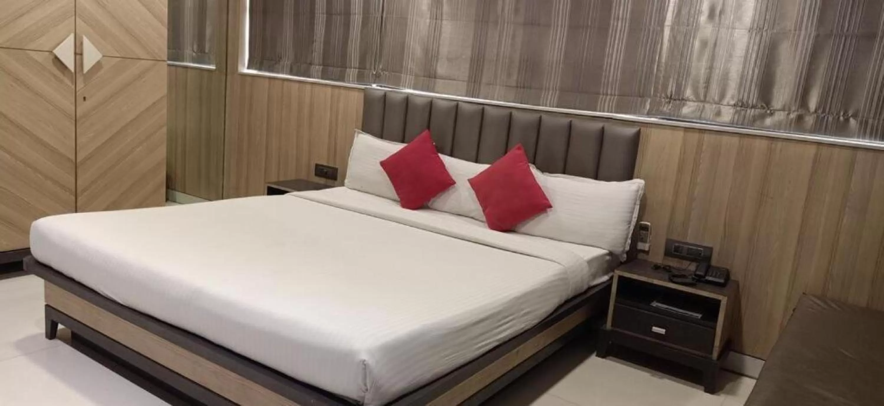 Bed in HOTEL PRATIKSHA RESIDENCY