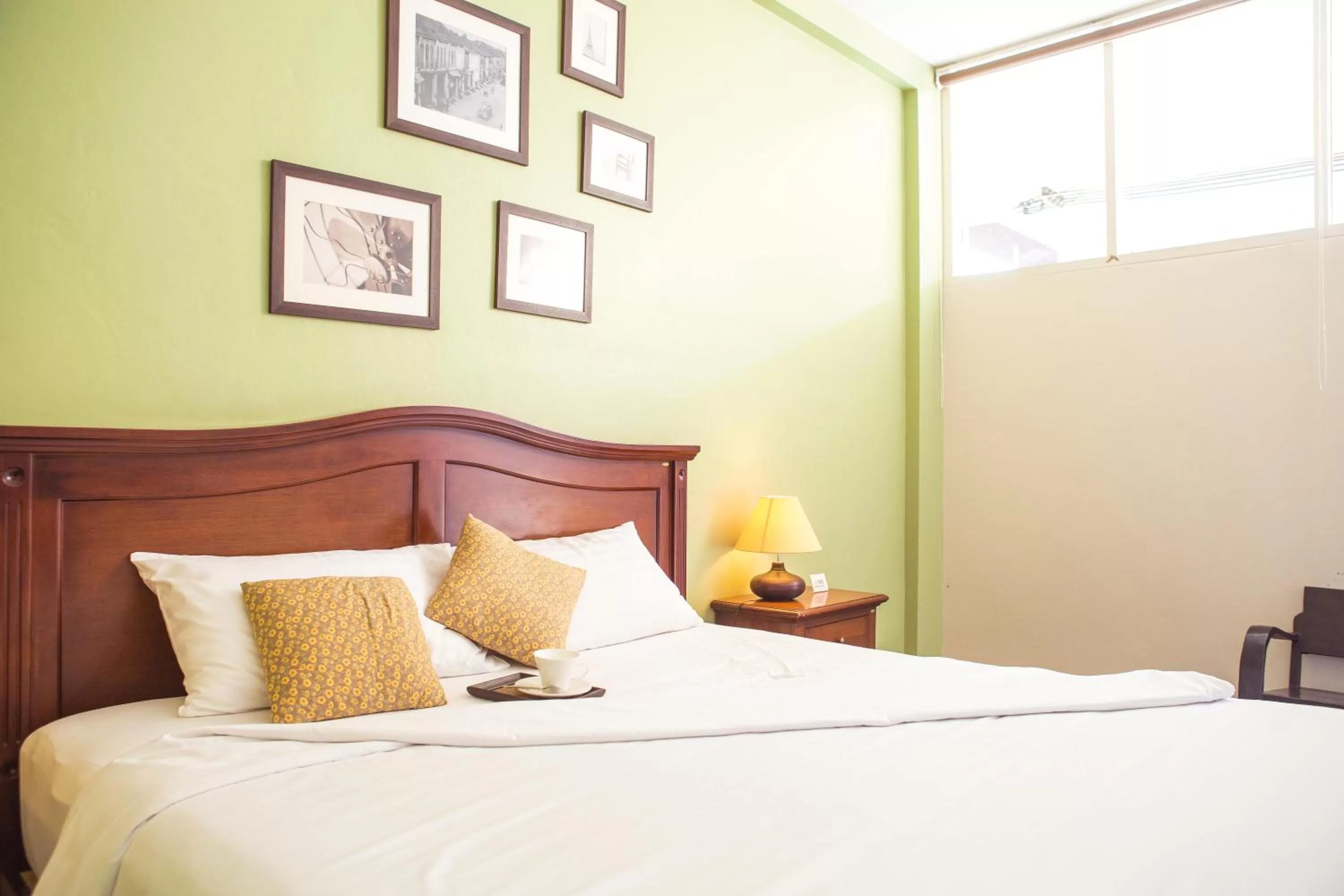 Bed in Feung Nakorn Balcony Rooms and Cafe