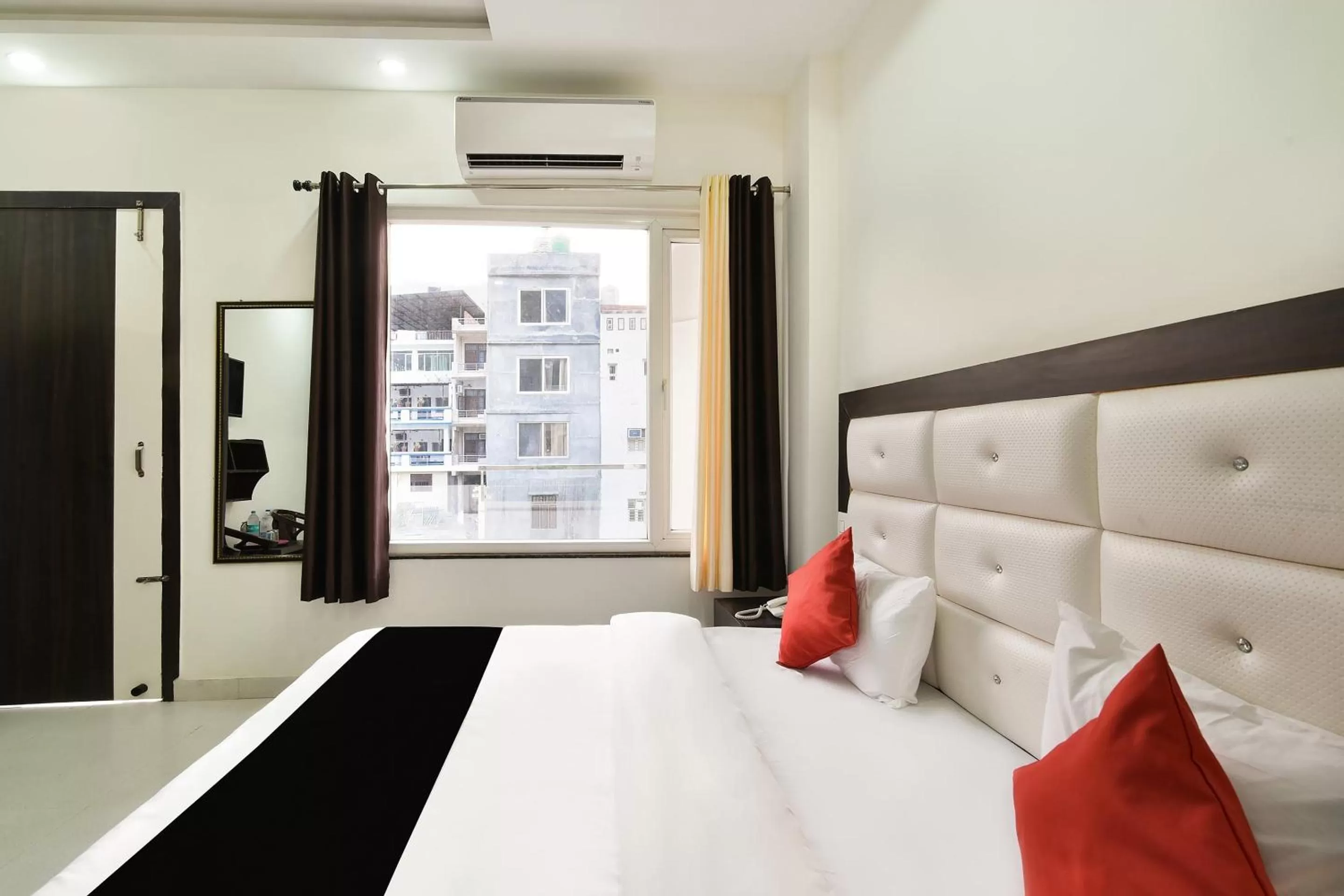 Bedroom, Bed in Capital O Yogasthali Inn Hotel And Spa