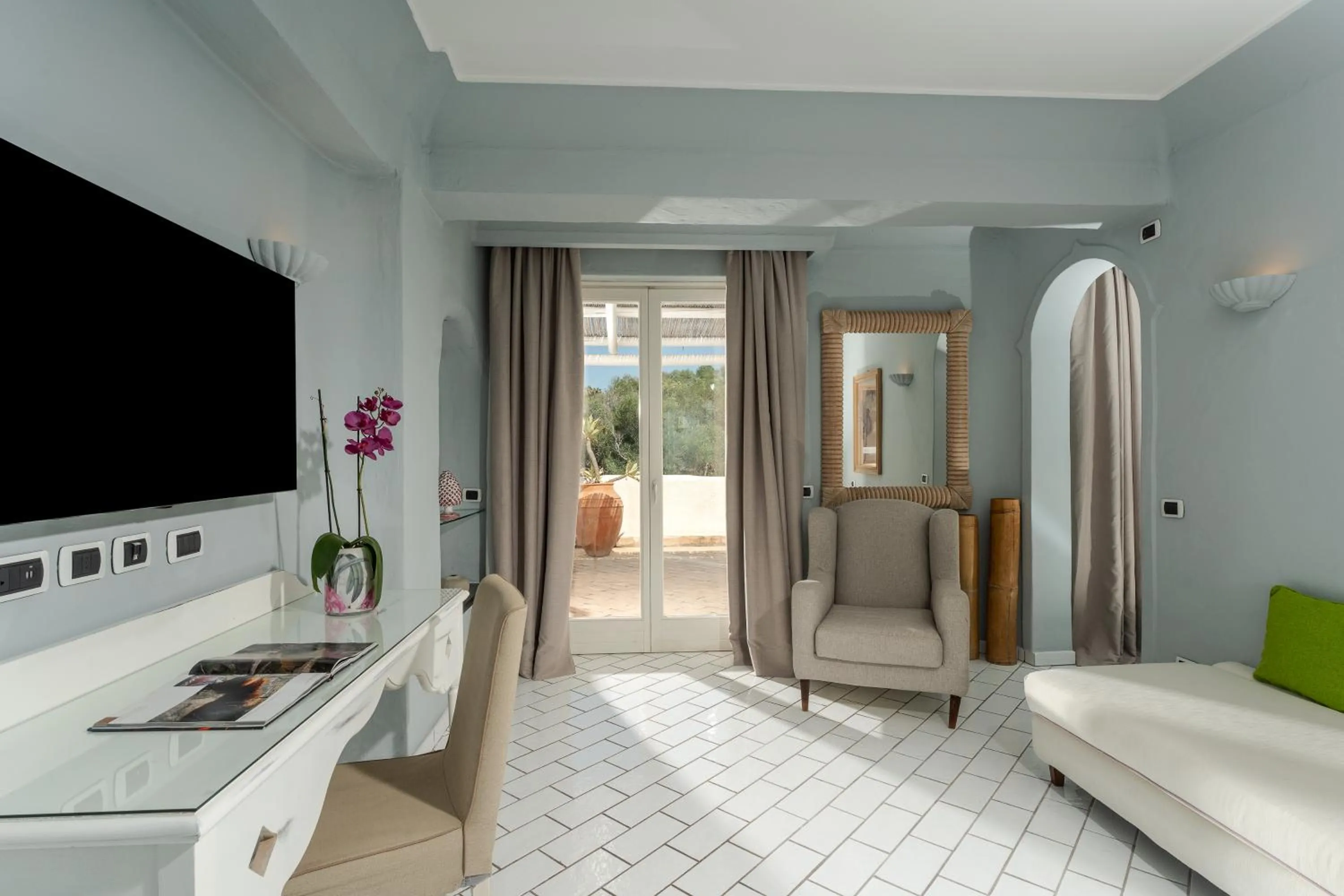 TV and multimedia in Therasia Resort Sea and SPA - The Leading Hotels of the World