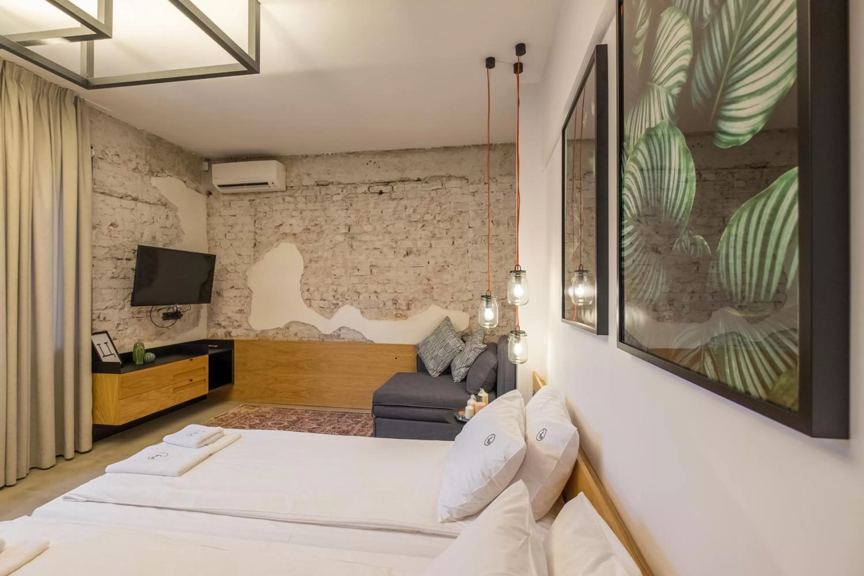 Bed in R34 Boutique Hotel