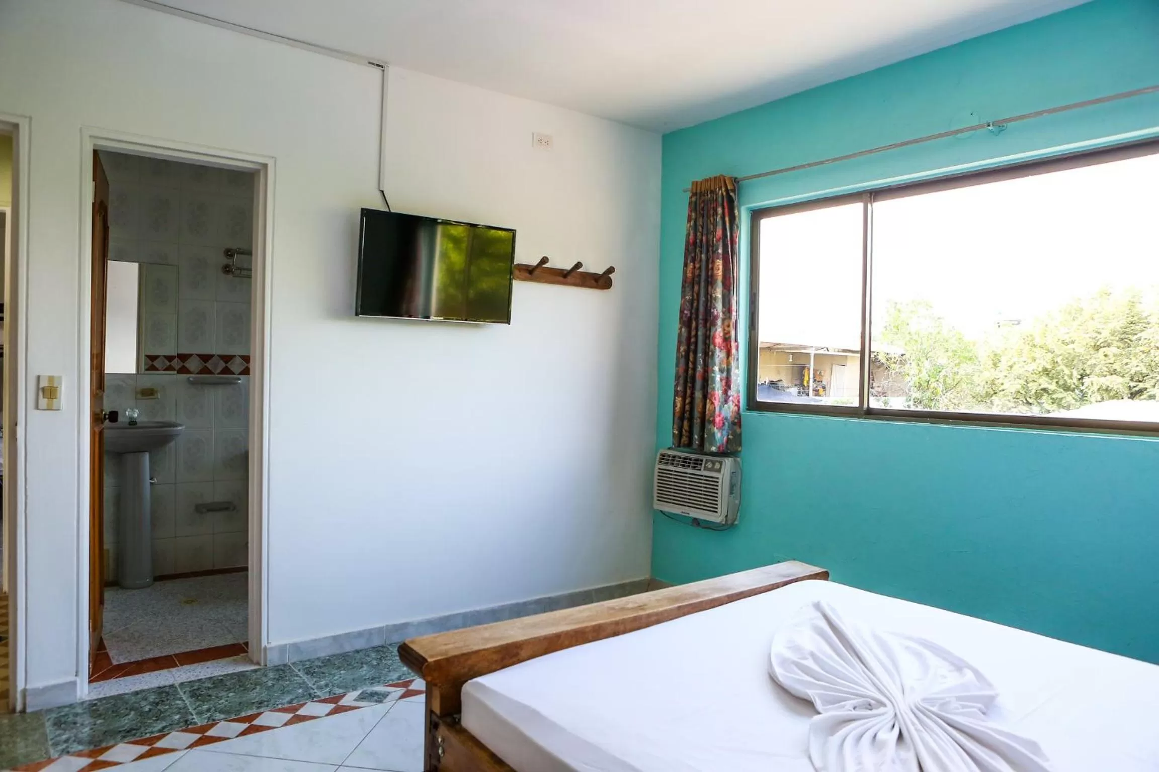 Bedroom, TV/Entertainment Center in Hotel Anamichu Suites