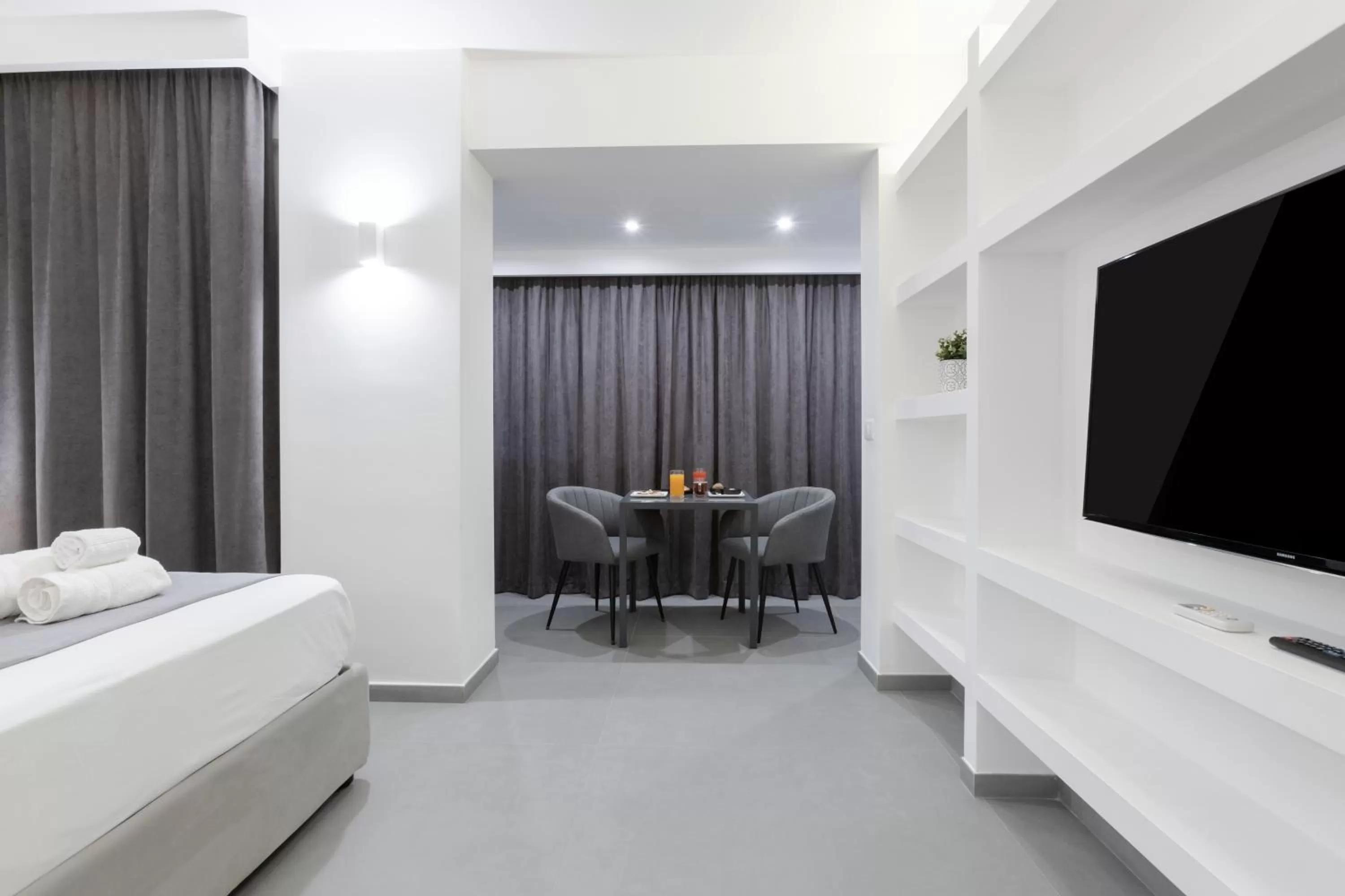 TV and multimedia, Bed in Suite Palermo Apartment