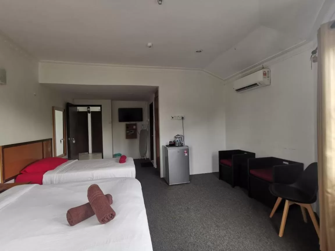 Bed in THE ZULEY HERITAGE HOTEL