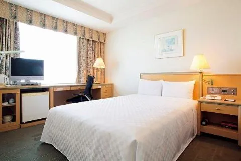 Bed in Keio Plaza Hotel Hachioji