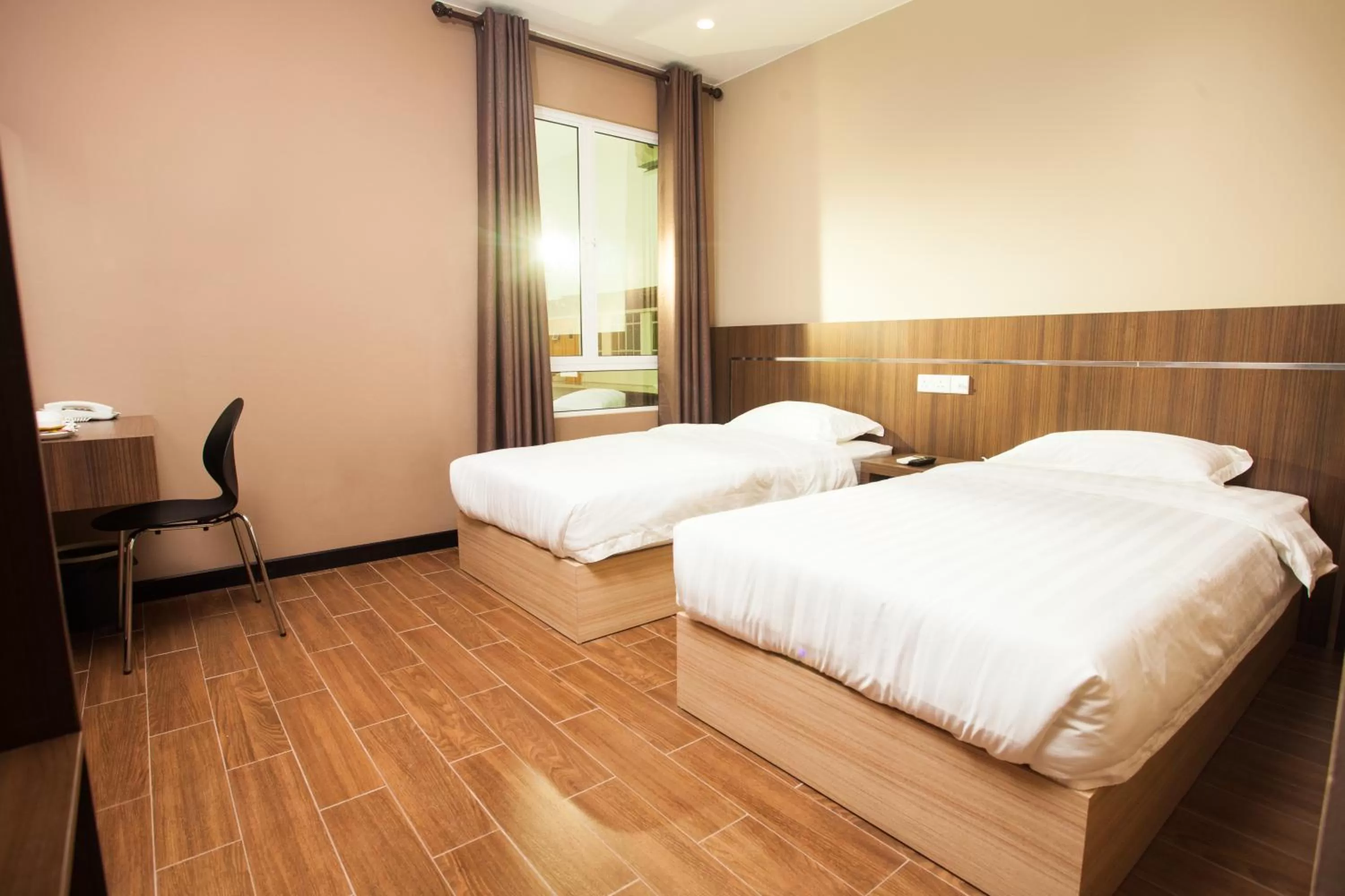 Photo of the whole room in Friendly Hotel