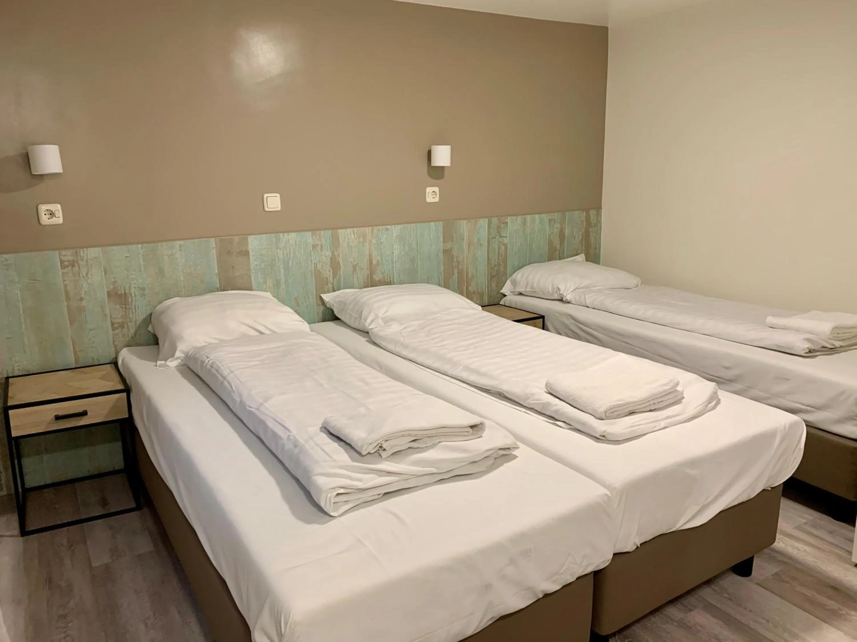 Bed in Hotel Damrak Inn