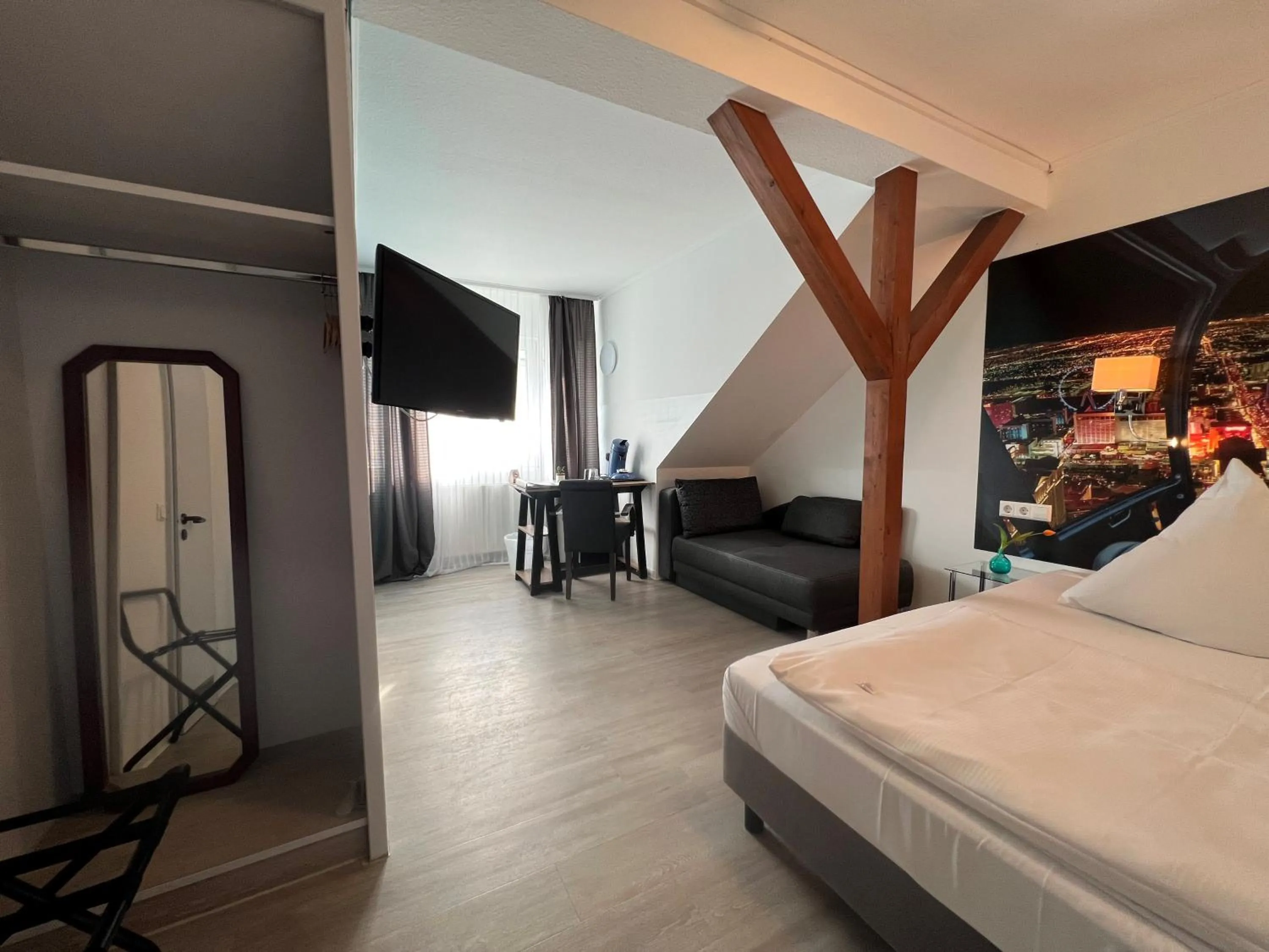 Photo of the whole room, Bed in Hotel Bitzer Backnang