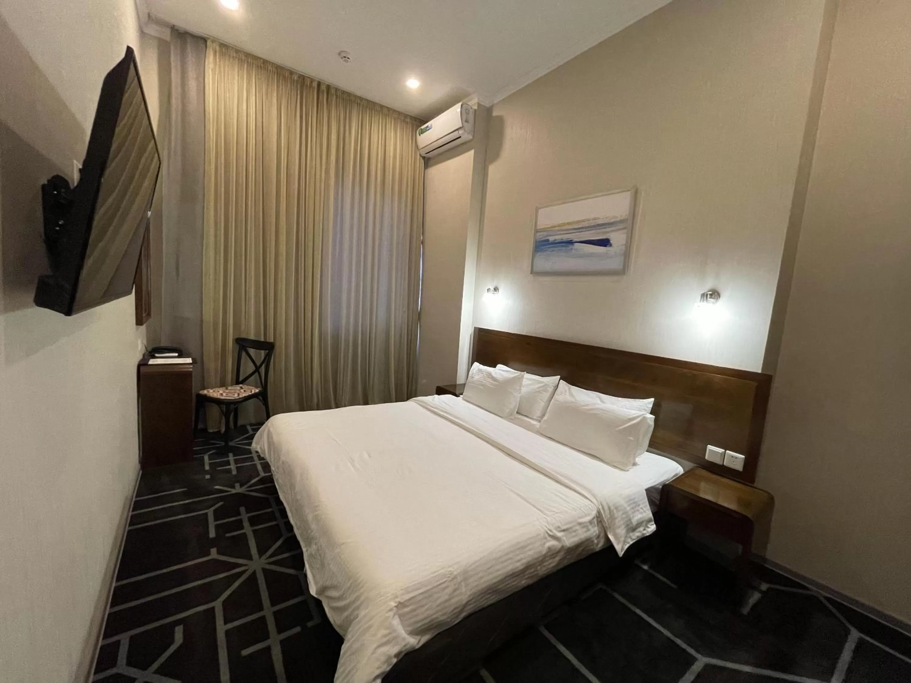 Photo of the whole room, Bed in City Centre Hotel