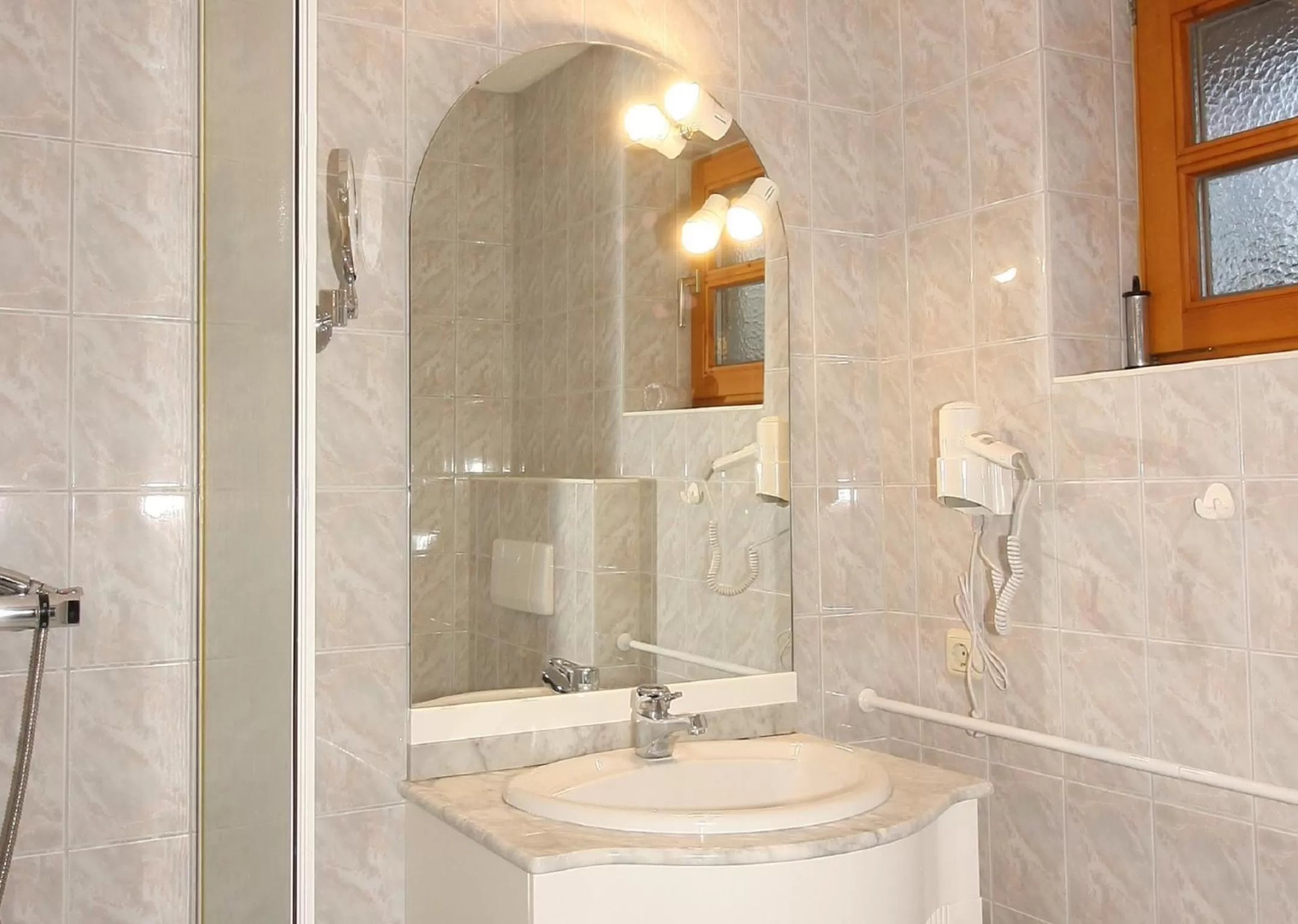 Bathroom in PAGA Hotel