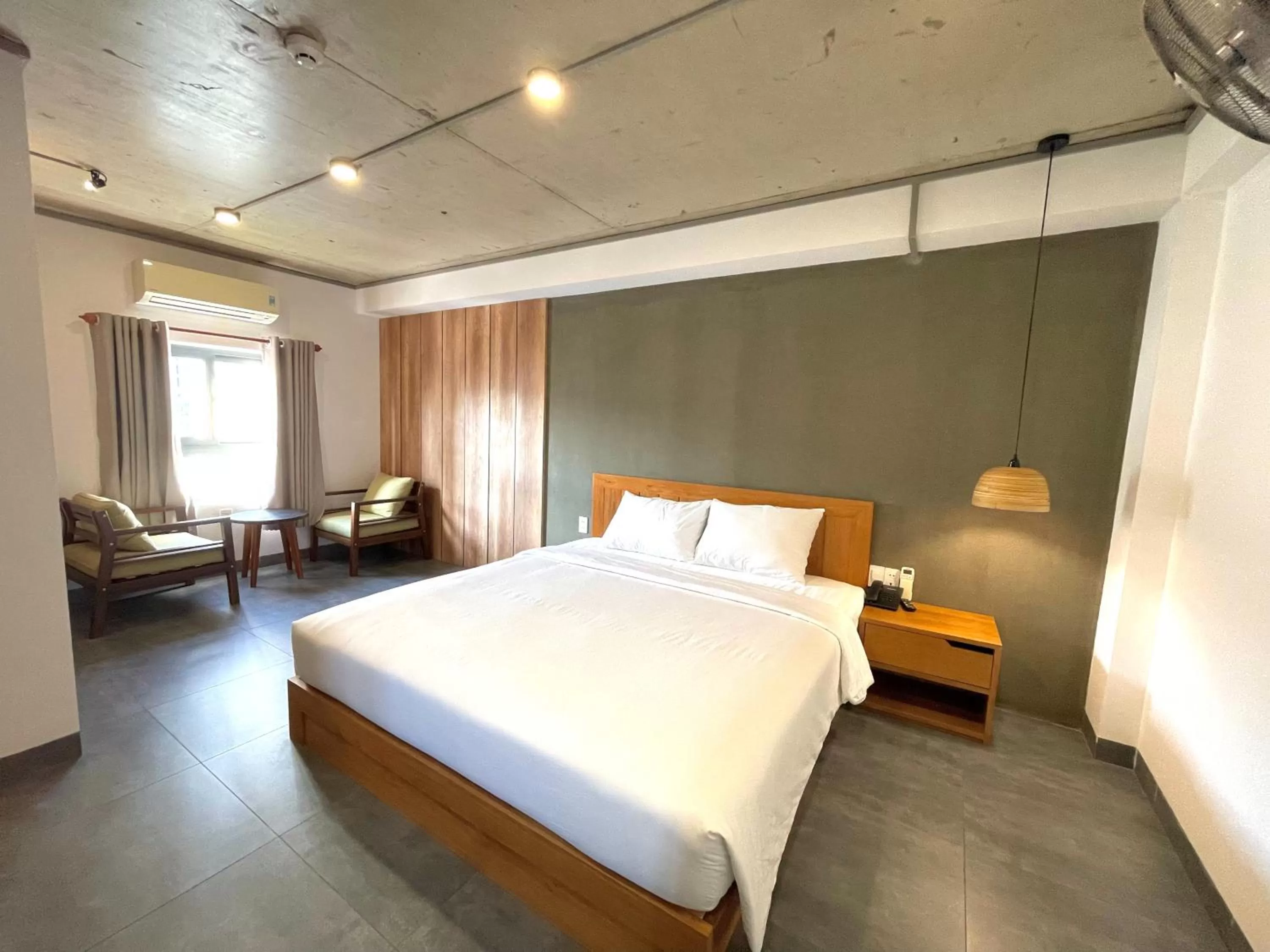 Bed in Coast House Boutique Hotel