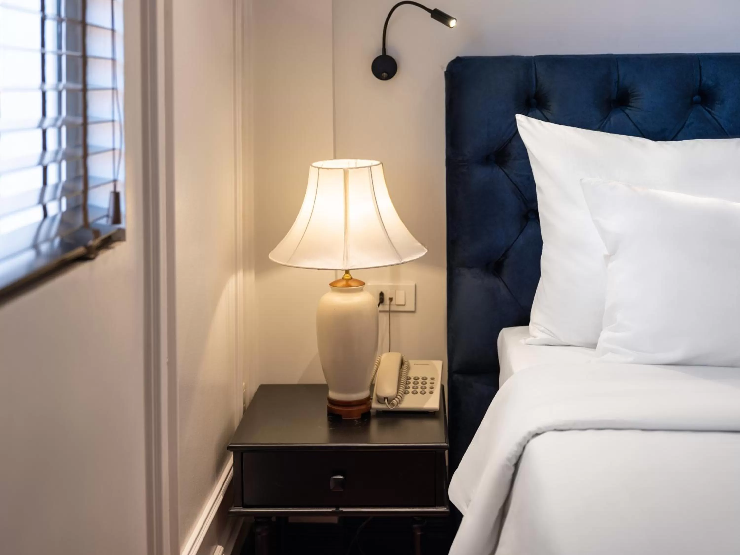 Bed in The Flower Boutique Hotel & Travel