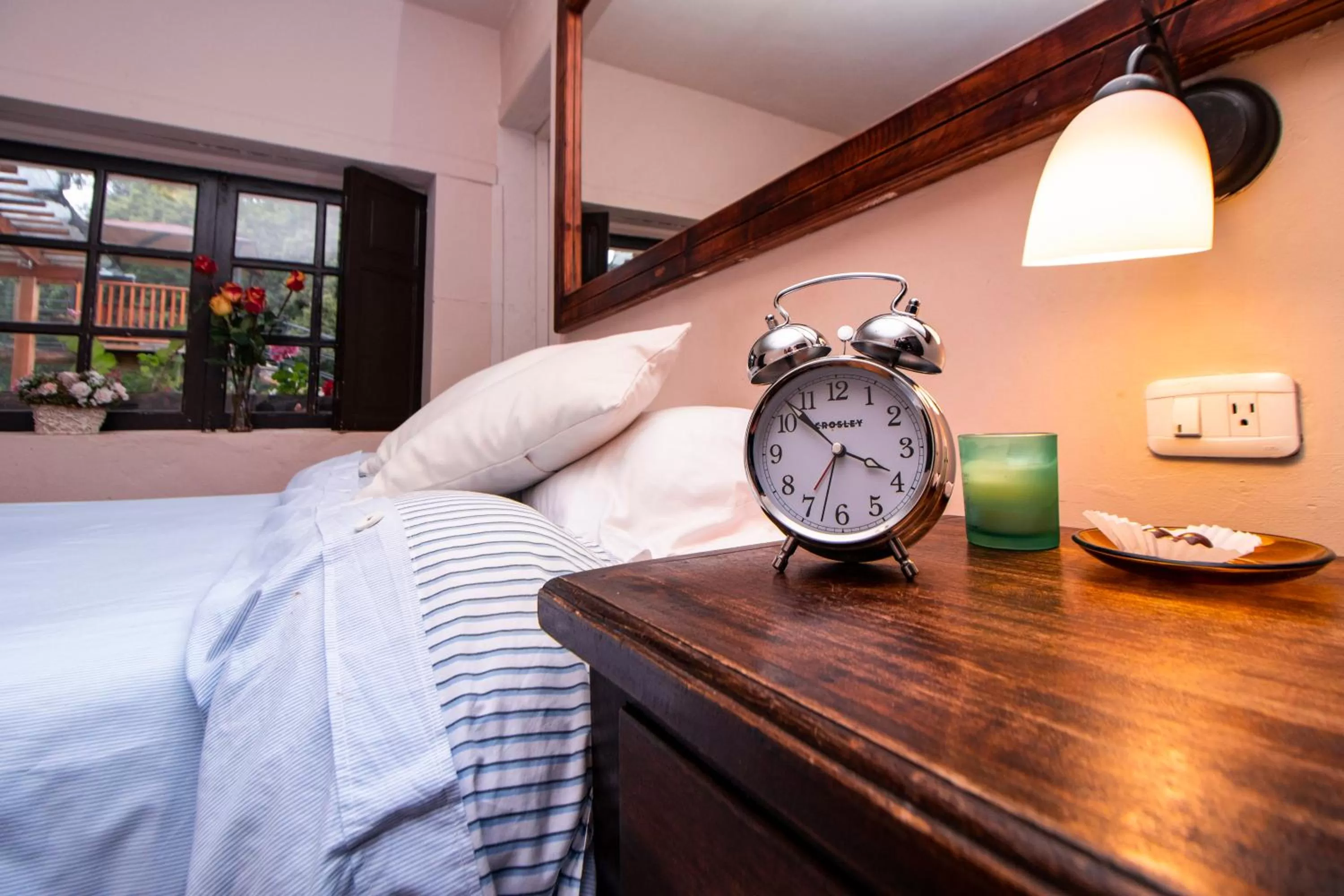 Bed in Hosteria Papagayo Cotopaxi