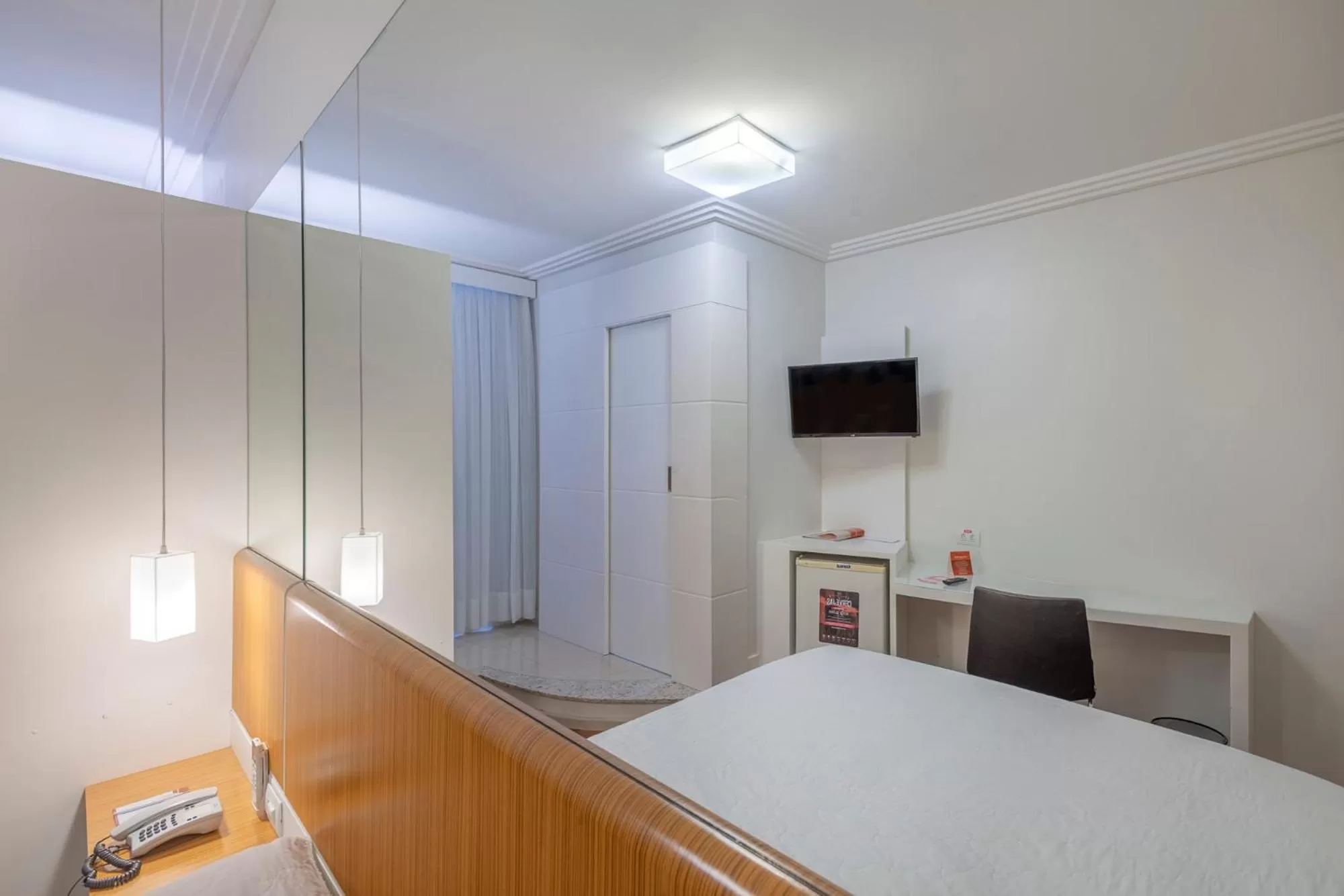 Bed in Hotel Glória