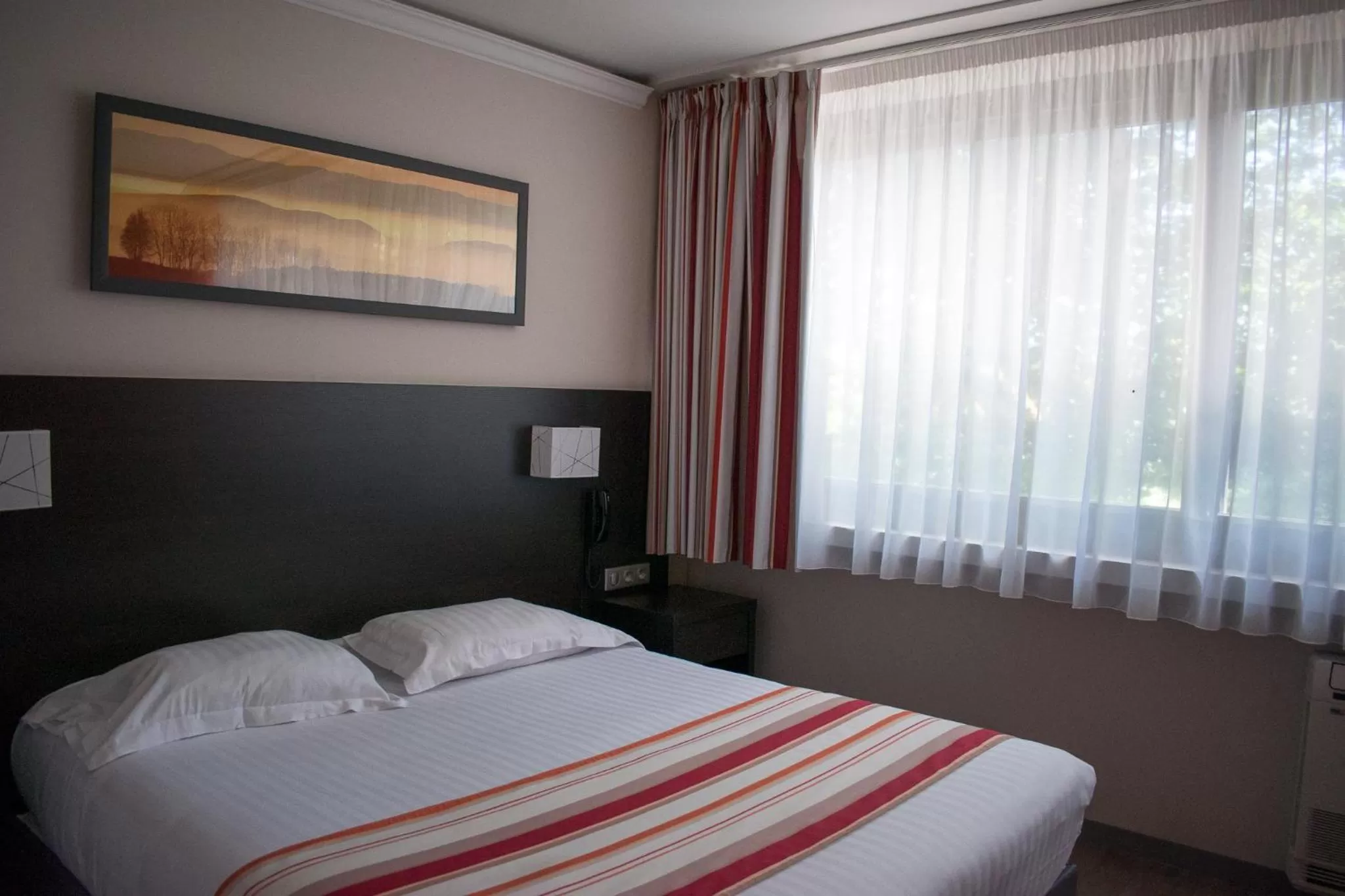 Standard Double Room in Logis Hotel Restaurant Black and Green Limoges Sud