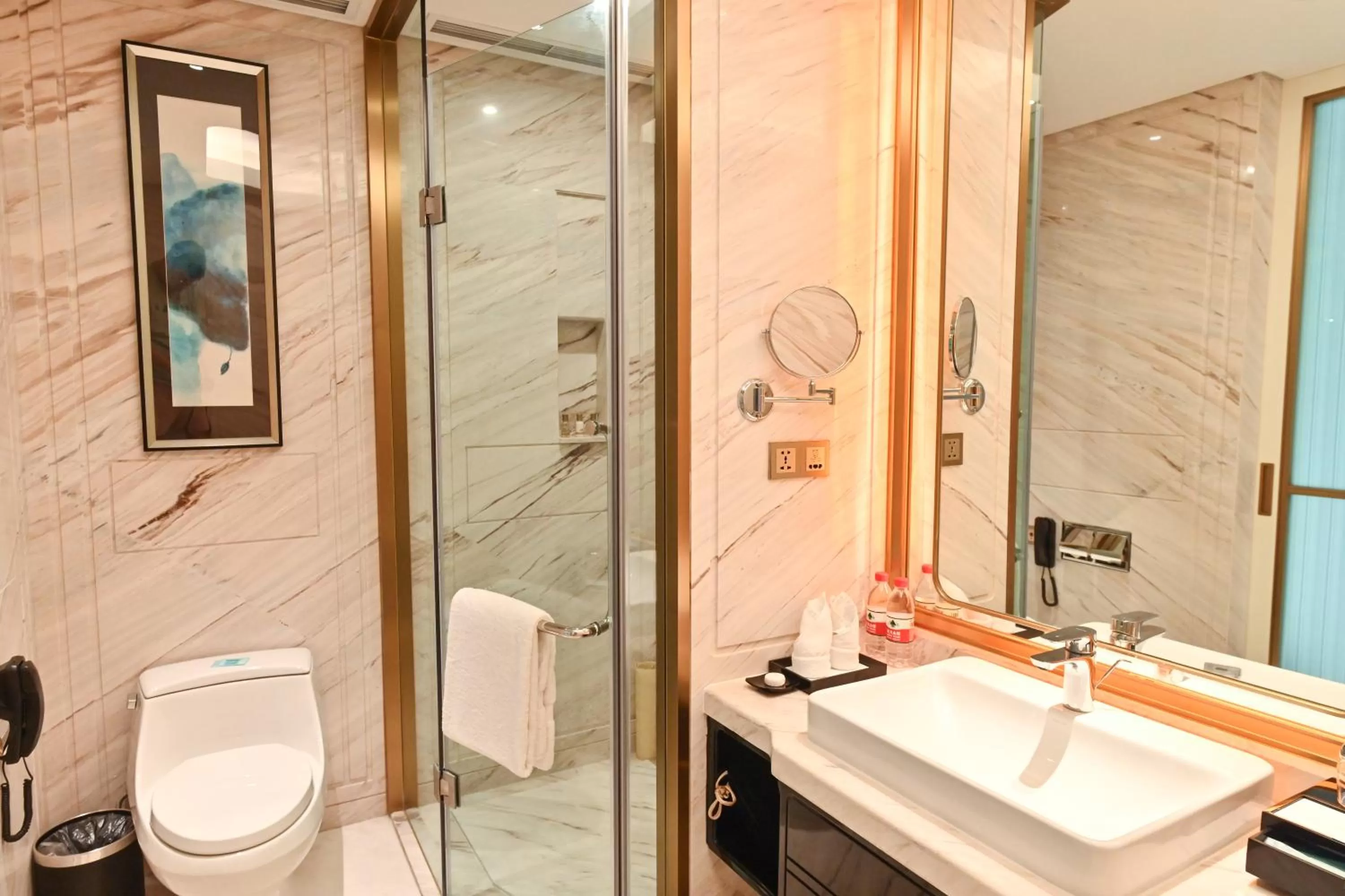 Bathroom in Wyndham Qingdao l Free Fixed-Time Shuttle Service Between Hotel and Airport & North Railway Station l Outdoor Children's Amusement Park l 1-Hour Play Snooker or Table Tennis