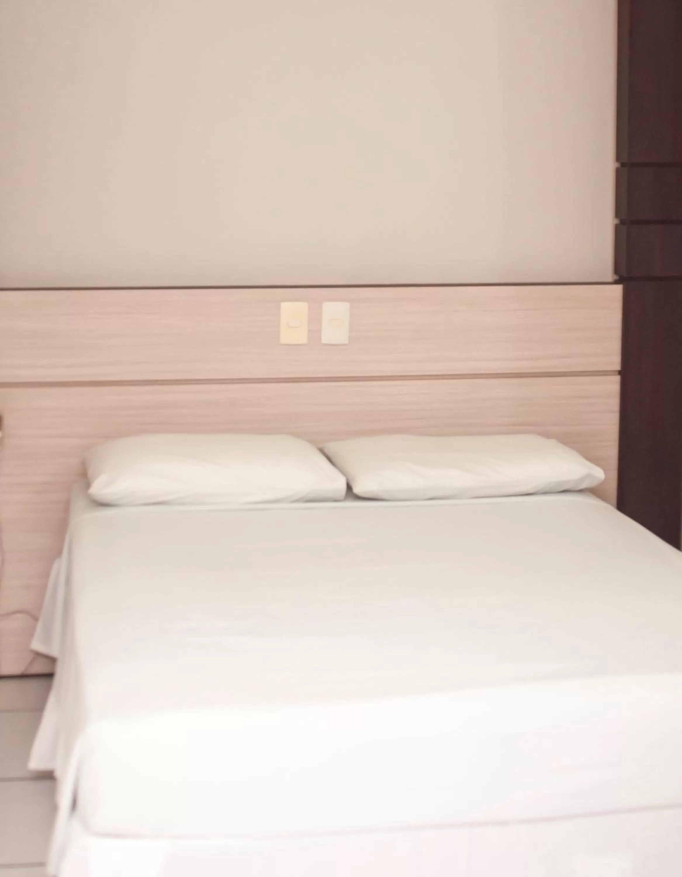 Bed in SMART IGUASSU HOTEL