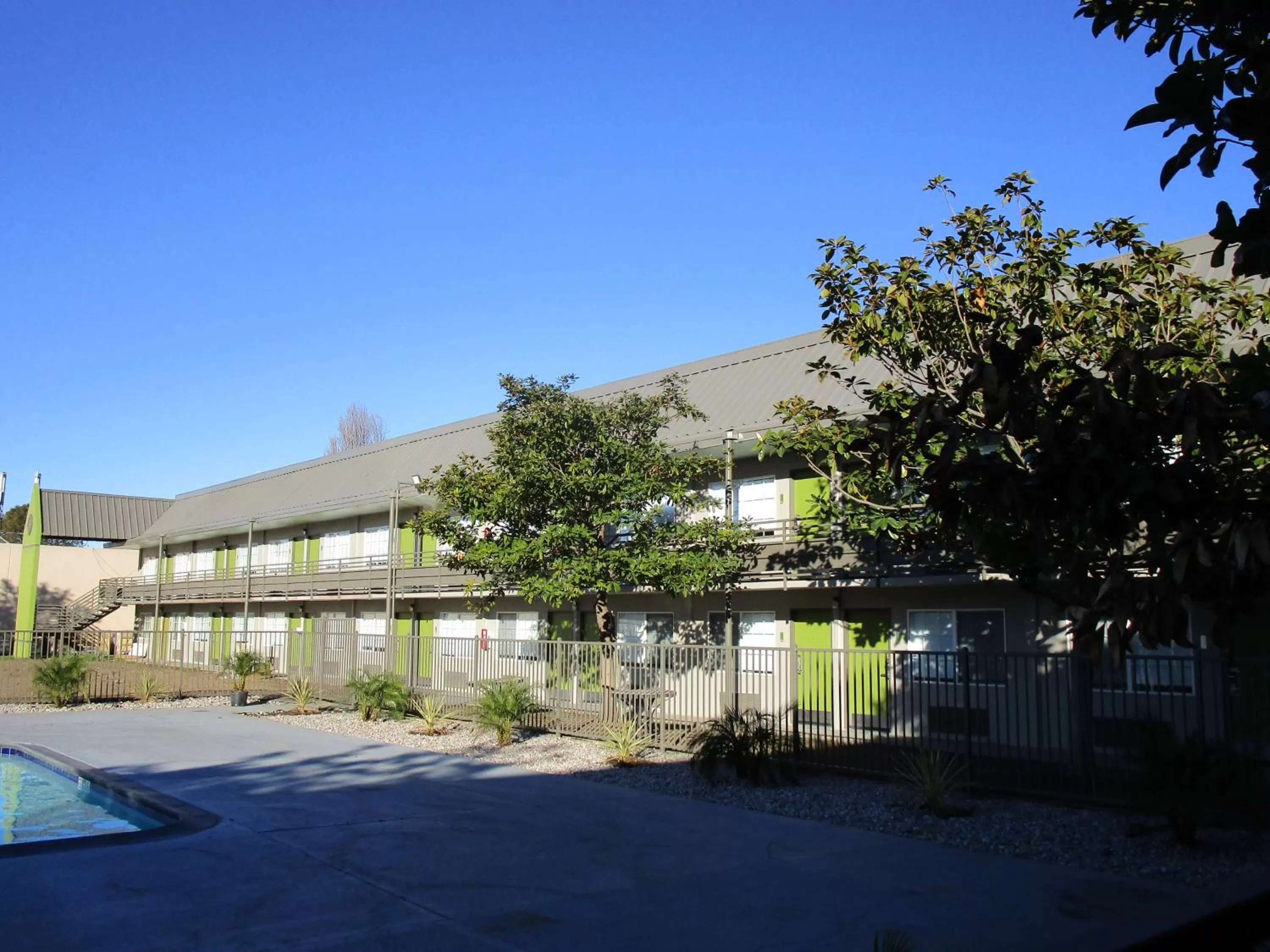 Property building in SureStay Plus Hotel by Best Western Point Richmond