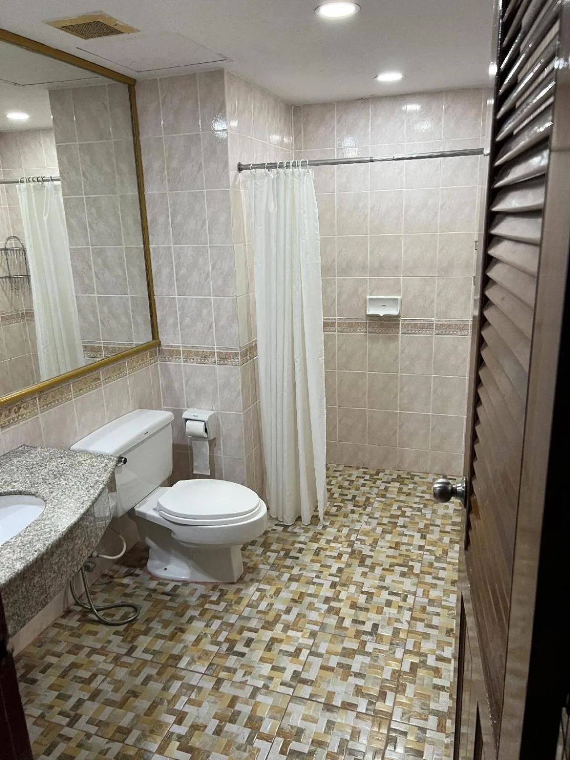 Shower in Mall Suites Hotel