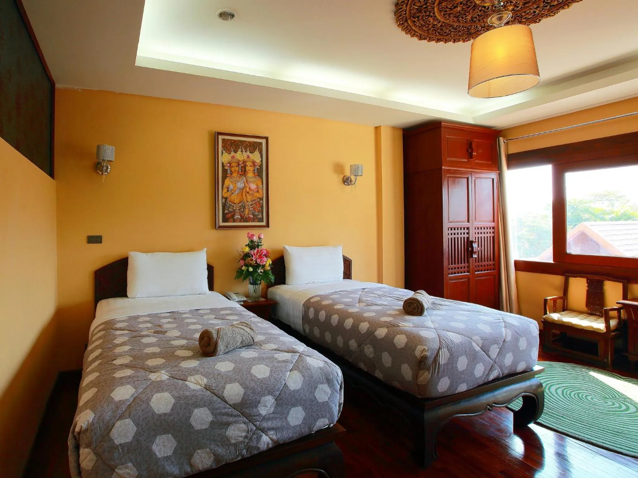 Bed in At Chiang Mai Hotel