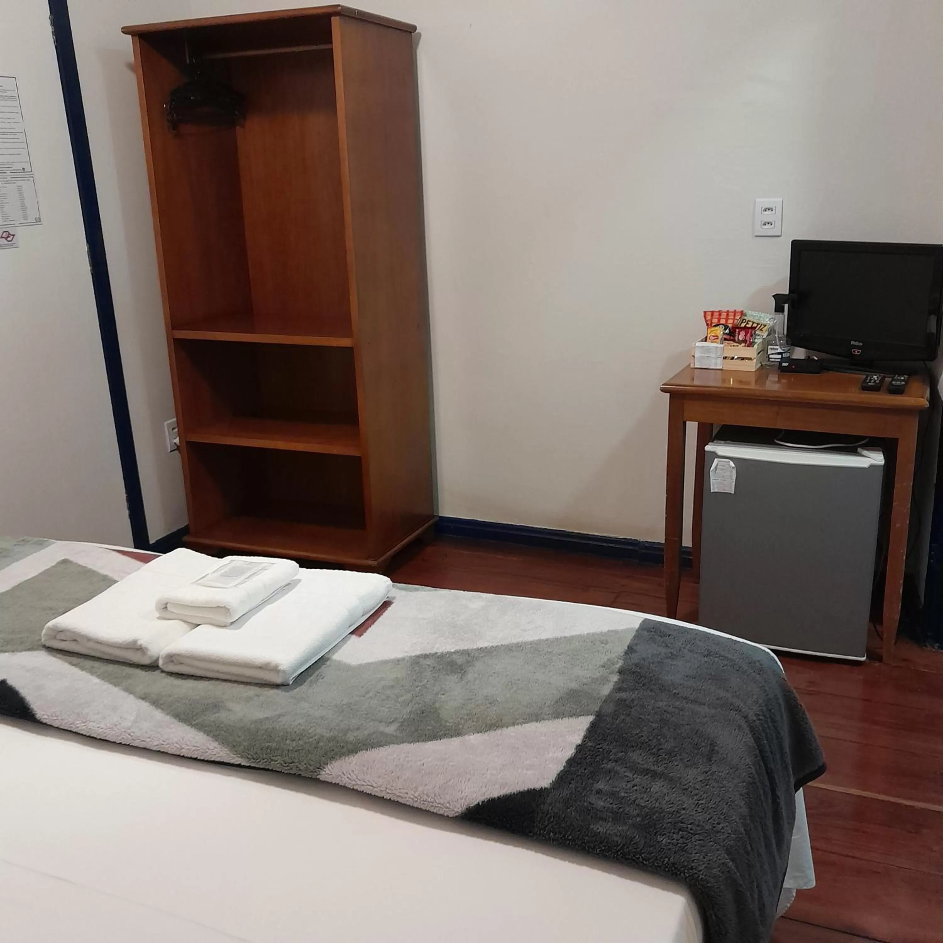 Bed, TV/Entertainment Center in Hotel Barroco Mineiro
