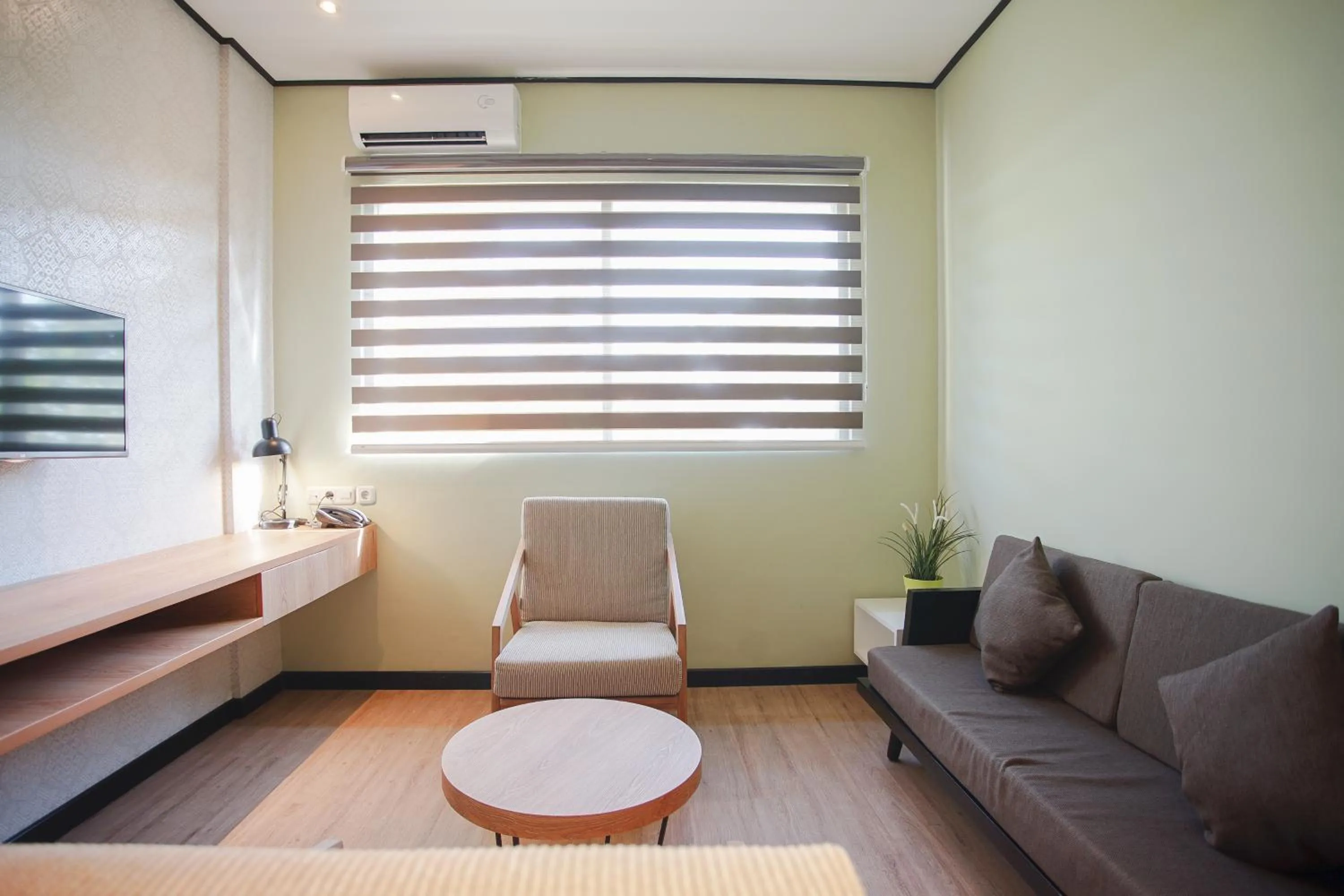 Living room in Allstay Ecotel Yogyakarta