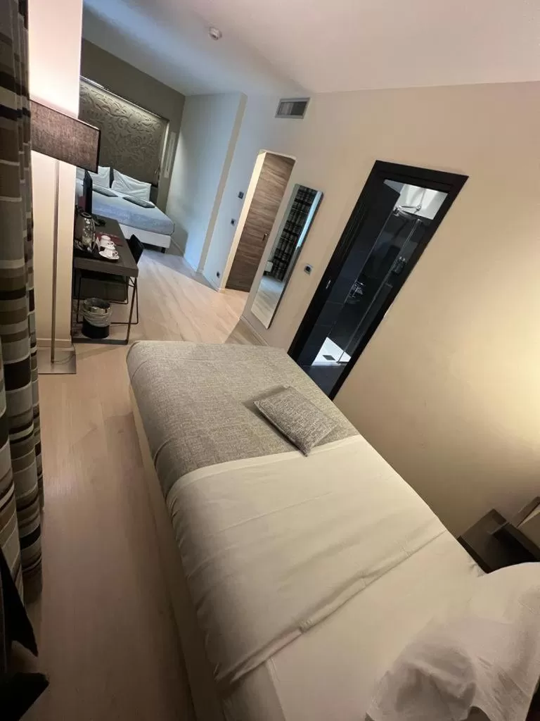 Bed in Hotel Diplomatic