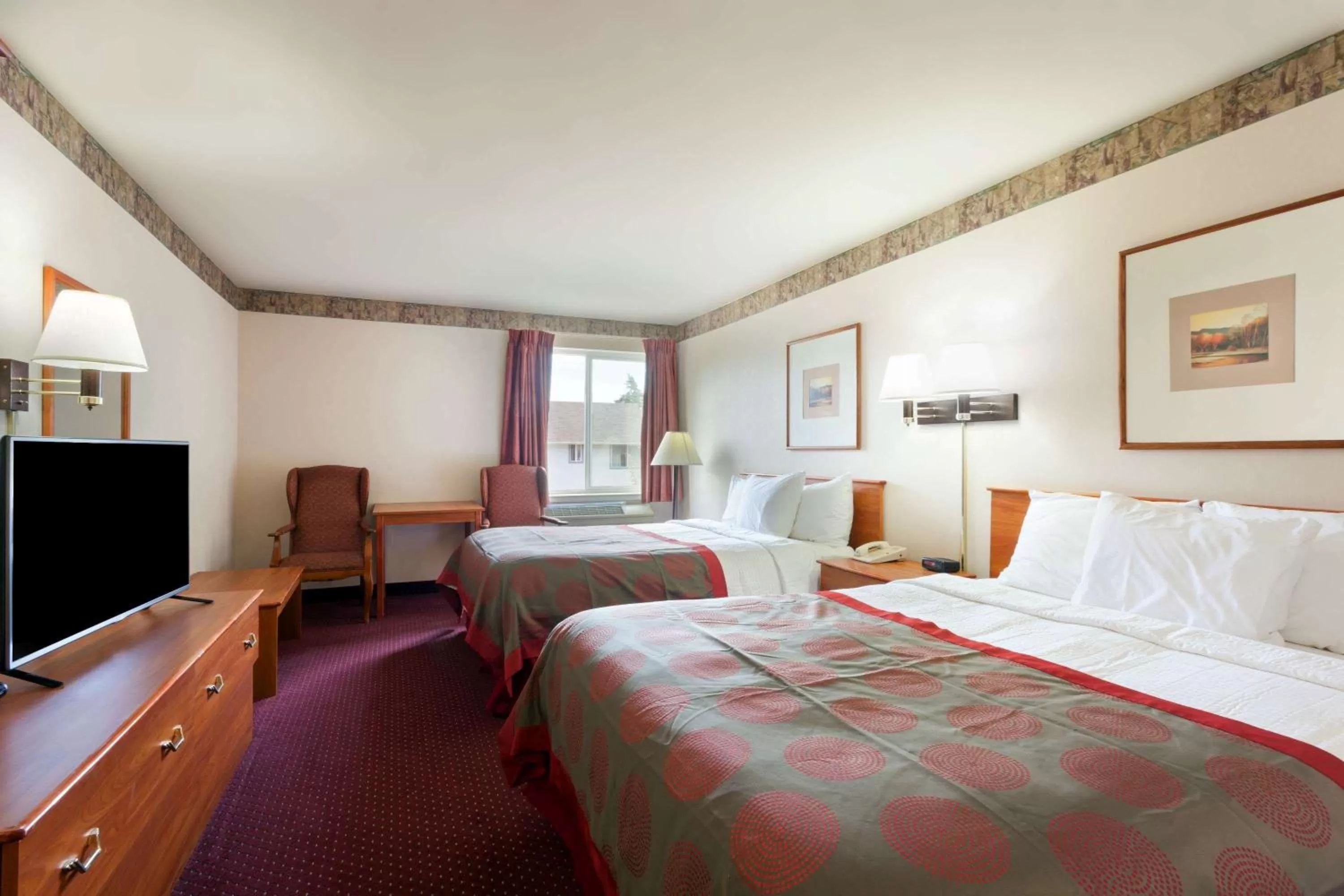 Photo of the whole room, Bed in Ramada by Wyndham SeaTac Airport North