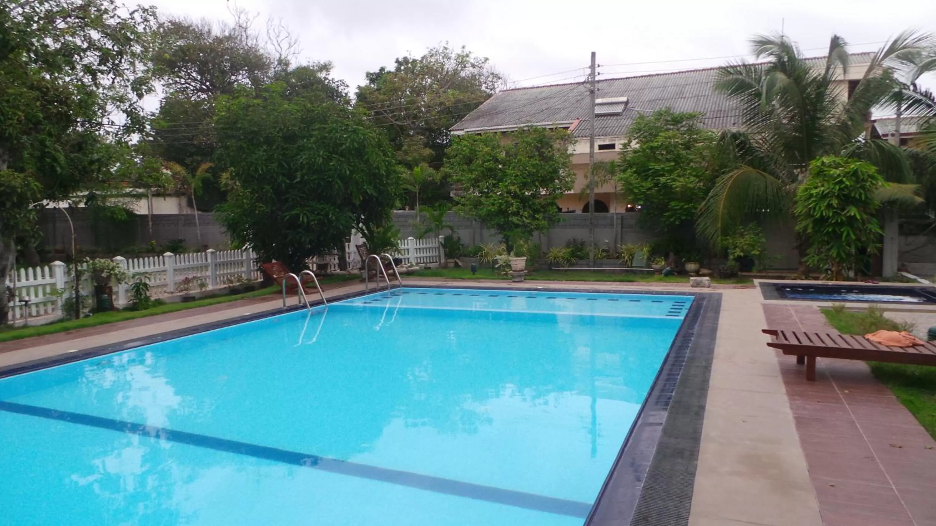 Garden, Swimming Pool in WindMill Beach Villa and Hotel