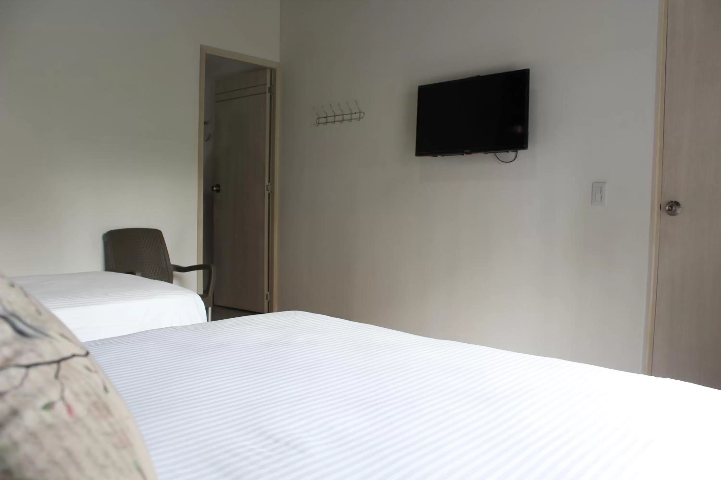 Bed in Hotel Boutique Plaza